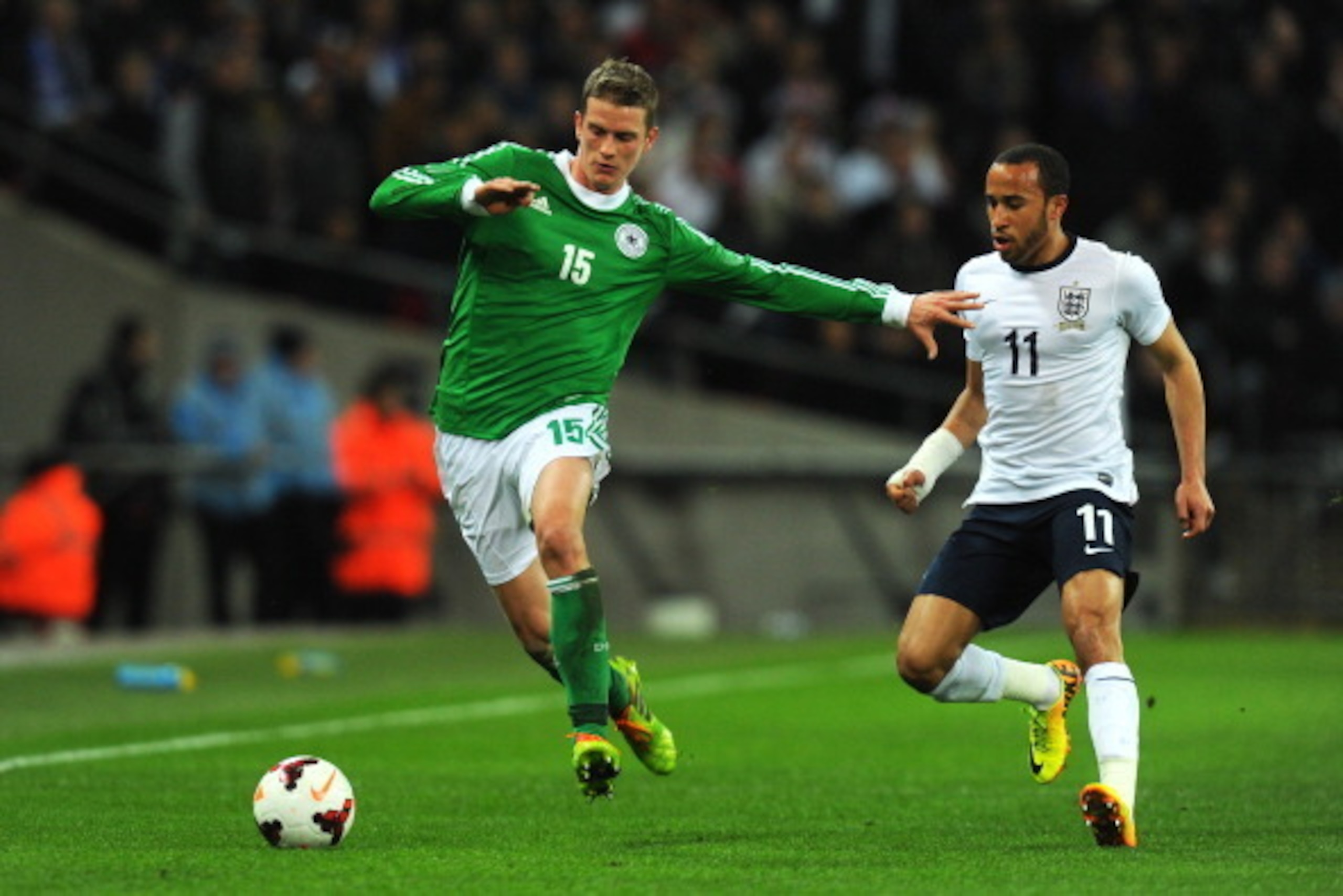 LONDON, ENGLAND - NOVEMBER 19:  Lars Bender of Germany holds off Andros Townsend of England during the international friendly match between England and Germany at Wembley Stadium on November 19, 2013 in London, England.  (Photo by Mike Hewitt/Getty Images