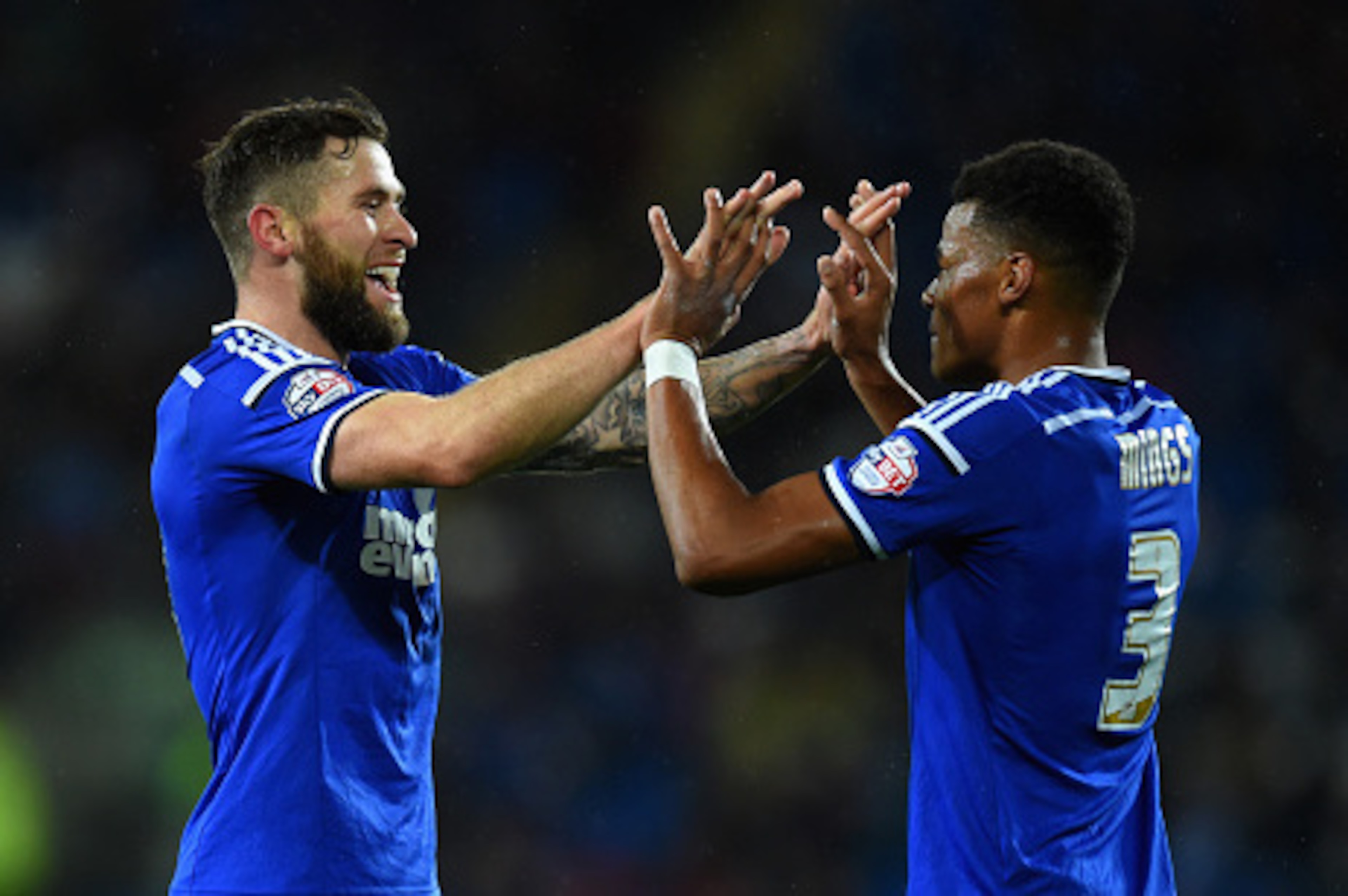 CARDIFF, WALES - OCTOBER 21:  Ipswich player Daryl Murphy (l) celebrates with Tyrone Mings after opening the scoring during the Sky Bet Championship match between Cardiff City and Ipswich Town at Cardiff City Stadium on October 21, 2014 in Cardiff, Wales.
