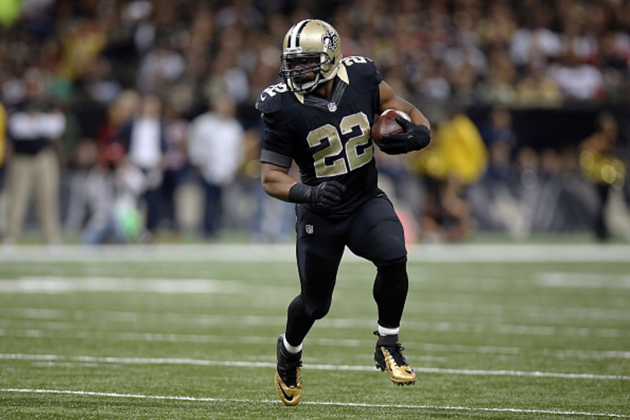 NEW ORLEANS, LA - NOVEMBER 09:  Mark Ingram #22 of the New Orleans Saints runs during the third quarter of a game against the San Francisco 49ers at the Mercedes-Benz Superdome on November 9, 2014 in New Orleans, Louisiana.  (Photo by Chris Graythen/Getty