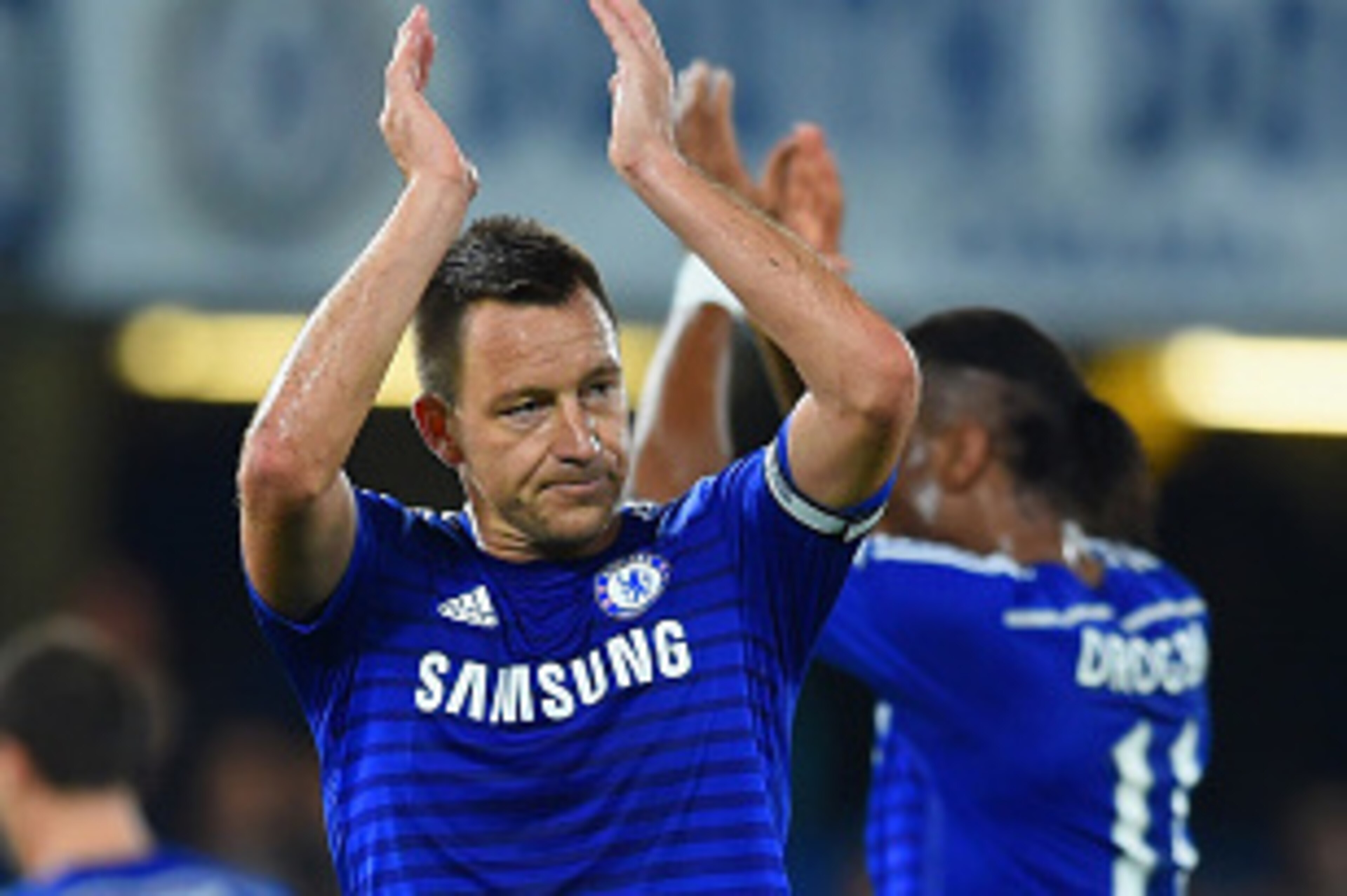 LONDON, ENGLAND - NOVEMBER 22: Captain John Terry of Chelsea applauds the fans during the Barclays Premier League match between Chelsea and West Bromwich Albion at Stamford Bridge on November 22, 2014 in London, England. (Photo by Paul Gilham/Getty Image LONDON, ENGLAND - NOVEMBER 22: Captain John Terry of Chelsea applauds the fans during the Barclays Premier League match between Chelsea and West Bromwich Albion at Stamford Bridge on November 22, 2014 in London, England. (Photo by Paul Gilham/Getty Image