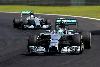 SAO PAULO, BRAZIL - NOVEMBER 09:  Nico Rosberg of Germany and Mercedes GP leads Lewis Hamilton of Great Britain and Mercedes GP during the Brazilian Formula One Grand Prix at Autodromo Jose Carlos Pace on November 9, 2014 in Sao Paulo, Brazil.  (Photo by 