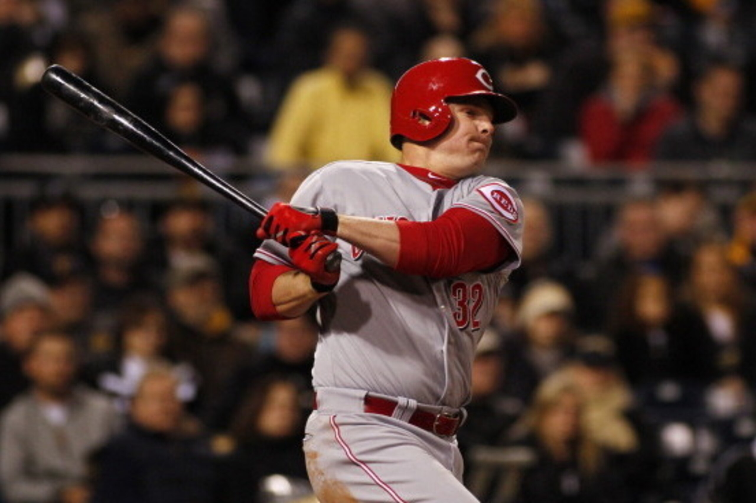 PITTSBURGH, PA - APRIL 23:  Jay Bruce #32 of the Cincinnati Reds hits into a fielder's choice in the fifth inning scoring Billy Hamilton #6 (not pictured) during the game against the Pittsburgh Pirates at PNC Park April 23, 2014 in Pittsburgh, Pennsylvani