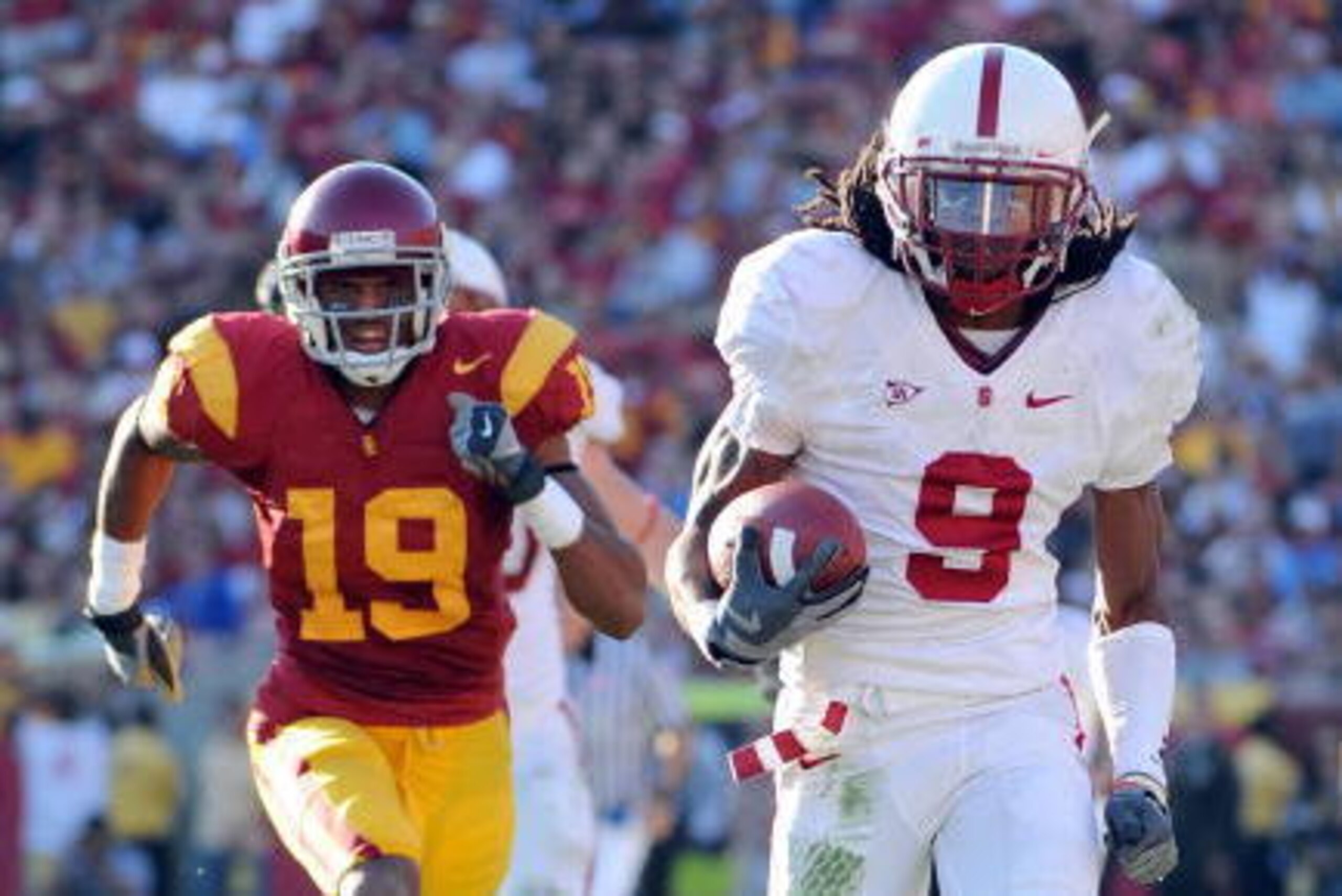 LOS ANGELES, CA - NOVEMBER 14:   Richard Sherman #9 of the Stanford Cardinal scores a touchdown off his interception as he is chased by Drew McAllister #19 of the USC Trojans during the second half at the Los Angeles Memorial Coliseum on November 14, 2009