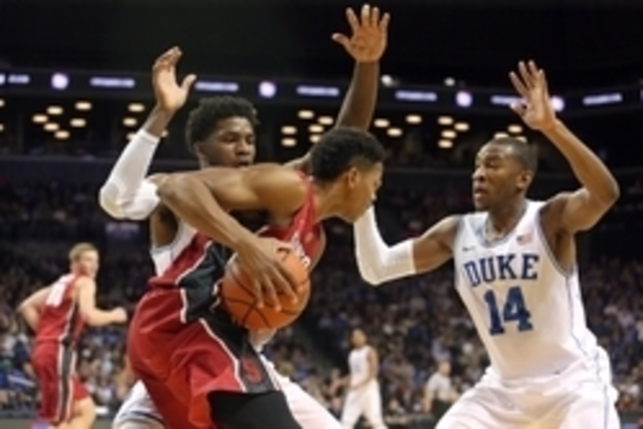 Nov 22, 2014; Brooklyn, NY, USA; Stanford Cardinal guard Anthony Brown (21) is defended by Duke Blue Devils forward Justise Winslow (12) and guard Rasheed Sulaimon (14) during the first half at Barclays Center. Mandatory Credit: Brad Penner-USA TODAY Spor Nov 22, 2014; Brooklyn, NY, USA; Stanford Cardinal guard Anthony Brown (21) is defended by Duke Blue Devils forward Justise Winslow (12) and guard Rasheed Sulaimon (14) during the first half at Barclays Center. Mandatory Credit: Brad Penner-USA TODAY Spor