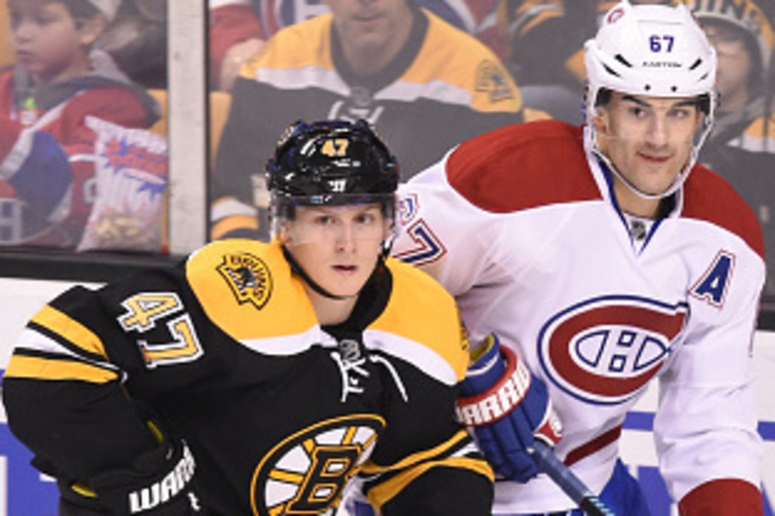 BOSTON, MA - NOVEMBER 22 : Torey Krug #47 of the Boston Bruins skates against Max Pacioretty #67 of the Montreal Canadiens at the TD Garden on November 22, 2014 in Boston, Massachusetts.  (Photo by Steve Babineau/NHLI via Getty Images)
