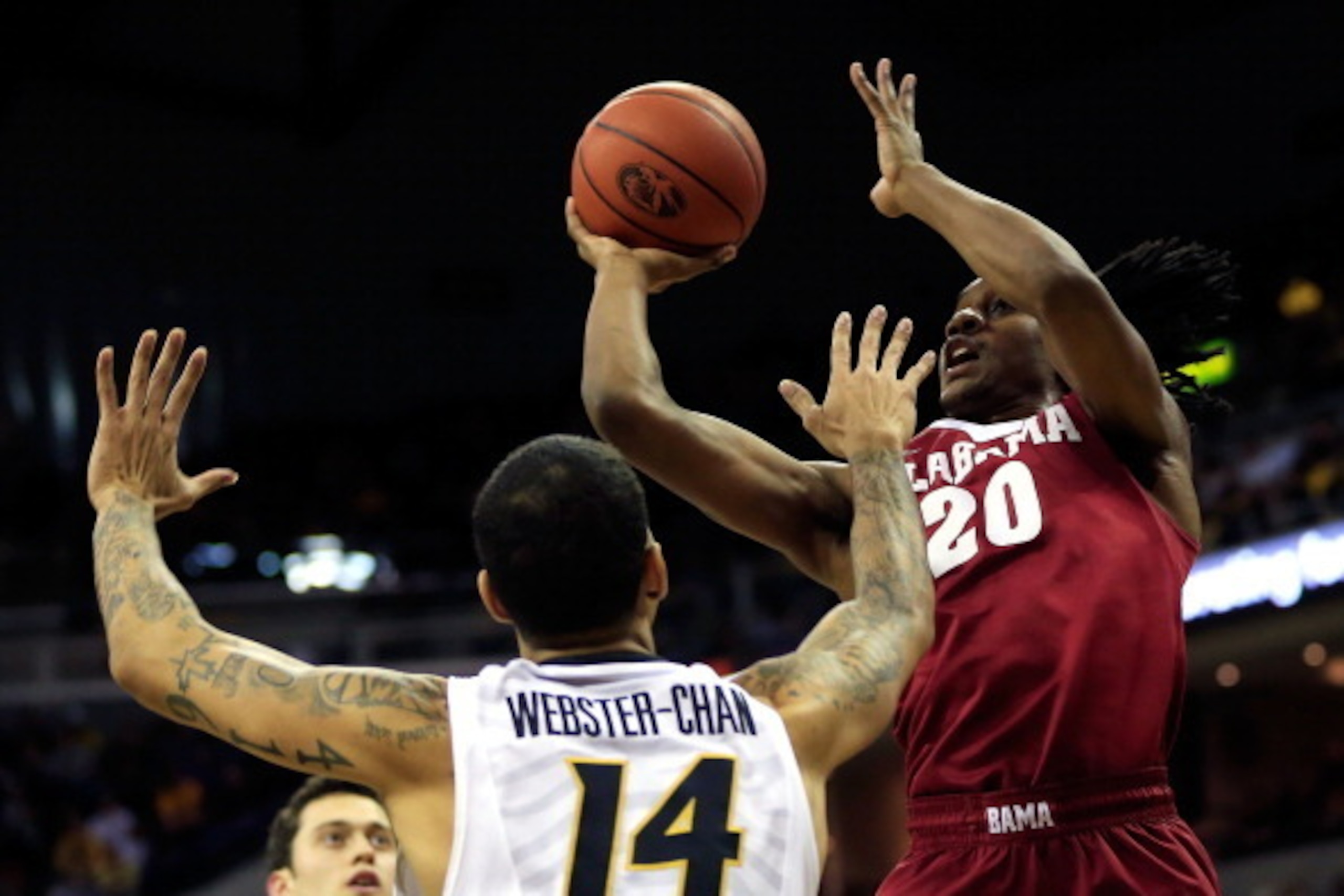 COLUMBIA, MO - JANUARY 08:  Levi Randolph #20 of the Alabama Crimson Tide shoots as Negus Webster-Chan #14 of the Missouri Tigers defends during the game at Mizzou Arena on January 8, 2013 in Columbia, Missouri.  (Photo by Jamie Squire/Getty Images)
