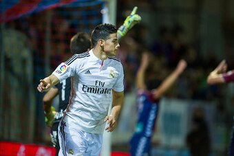 EIBAR, SPAIN - NOVEMBER 22:  James Rodriguez (L) of Real Madrid celebrates after scoring during the La Liga match betweenÊSD Eibar andÊReal Madrid at> at Ipurua Municipal Stadium on November 22, 2014 in Eibar, Spain.  (Photo by Juan Manuel Serrano Arce/Ge