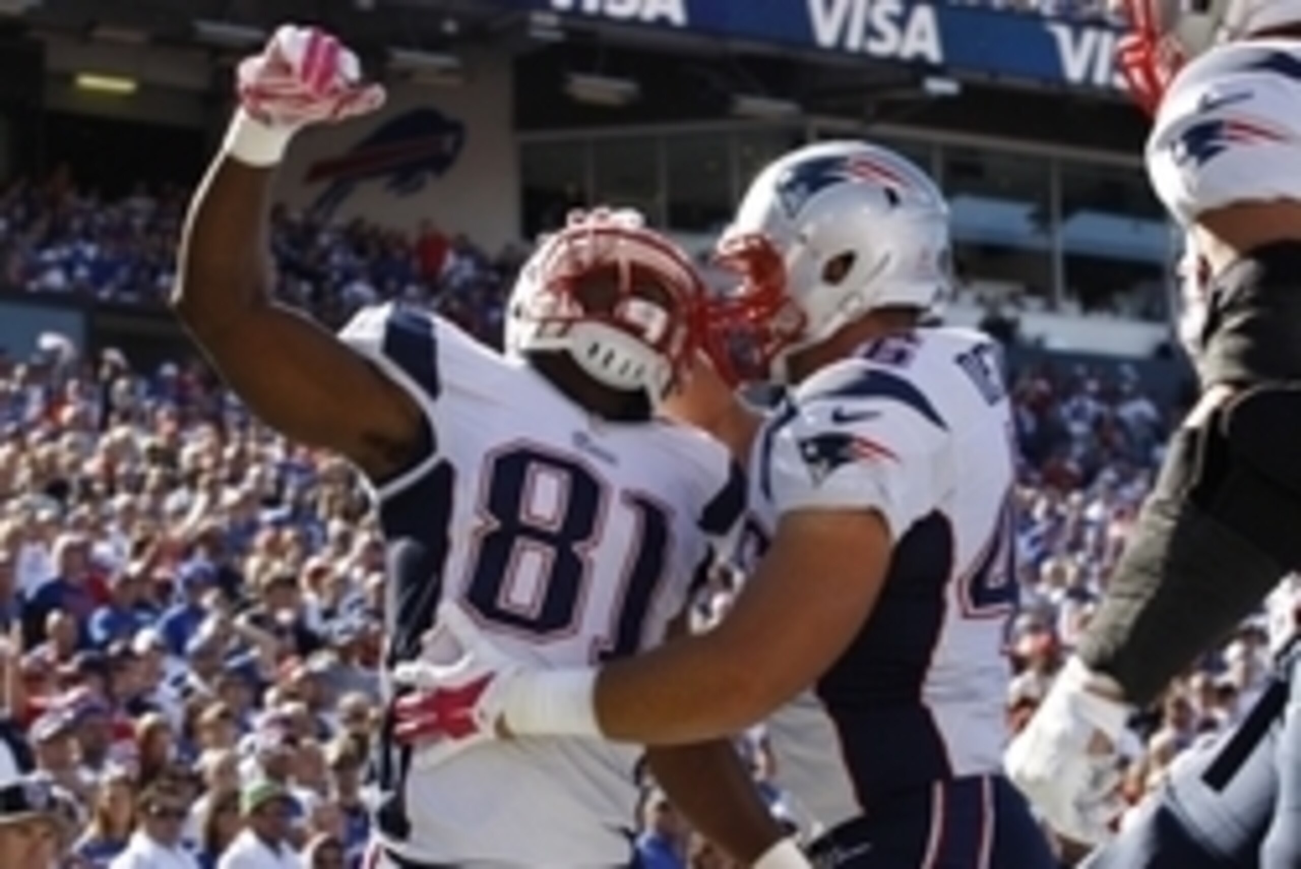 Oct 12, 2014; Orchard Park, NY, USA; New England Patriots tight end Timothy Wright (81) celebrates a touchdown with teammate fullback James Develin (46) during the first half against the Buffalo Bills at Ralph Wilson Stadium. Mandatory Credit: Timothy T. Oct 12, 2014; Orchard Park, NY, USA; New England Patriots tight end Timothy Wright (81) celebrates a touchdown with teammate fullback James Develin (46) during the first half against the Buffalo Bills at Ralph Wilson Stadium. Mandatory Credit: Timothy T.