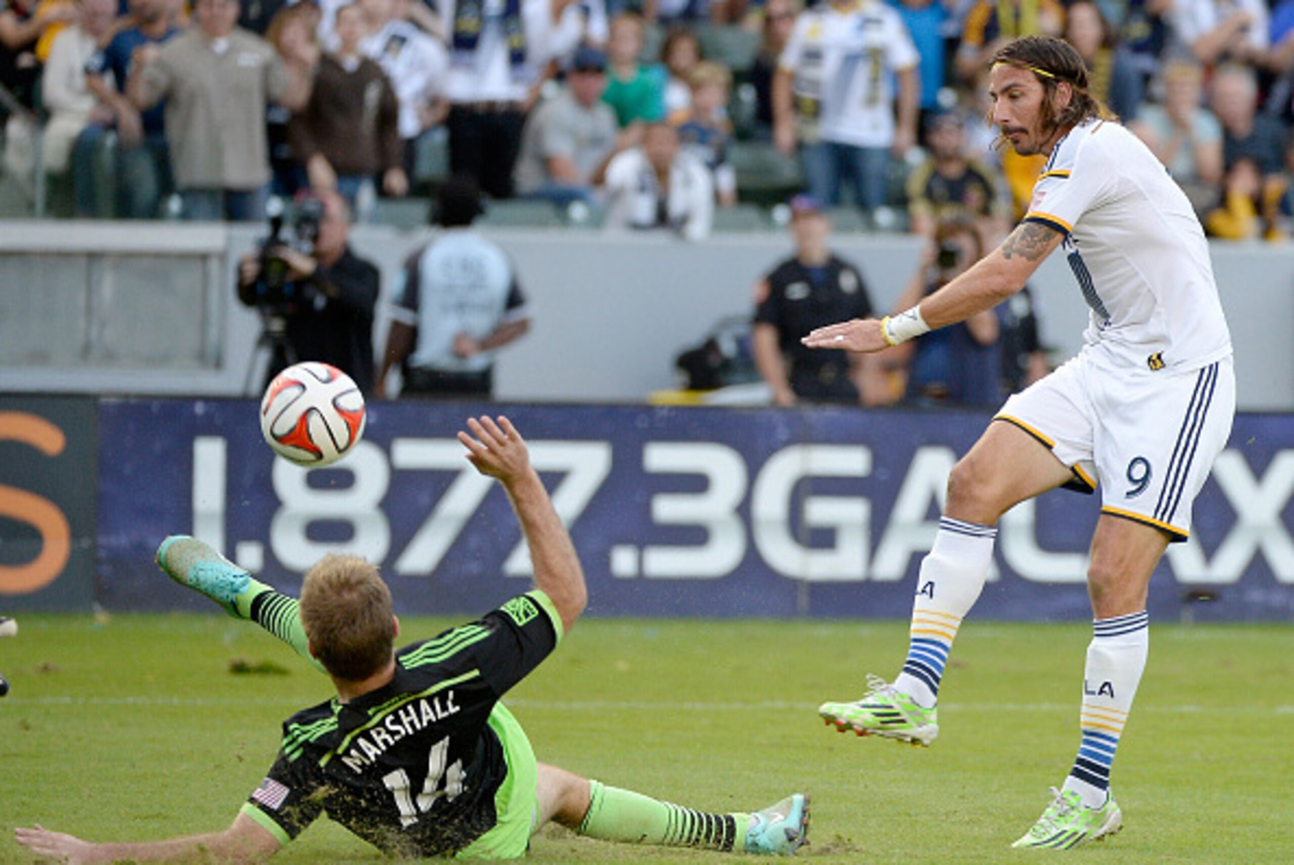 LOS ANGELES, CA - NOVEMBER 23:  Alan Gordon #9 of Los Angeles Galaxy has his shot blocked by Chad Marshall #14 of Seattle Sounders FC during a 2-1 Galaxy win in the Western Conference Final at StubHub Center on November 23, 2014 in Los Angeles, California