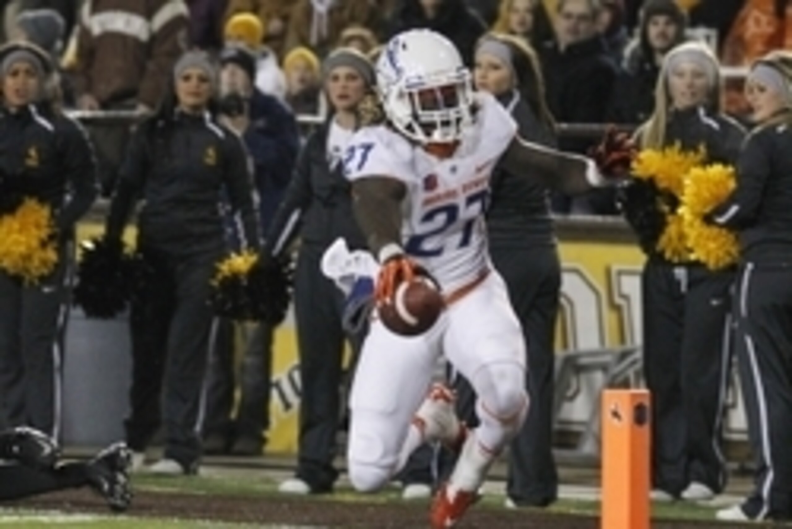 Nov 22, 2014; Laramie, WY, USA; Boise State Broncos running back Jay Ajayi (27) scores a touchdown against the Wyoming Cowboys during the first quarter at War Memorial Stadium. Mandatory Credit: Troy Babbitt-USA TODAY Sports