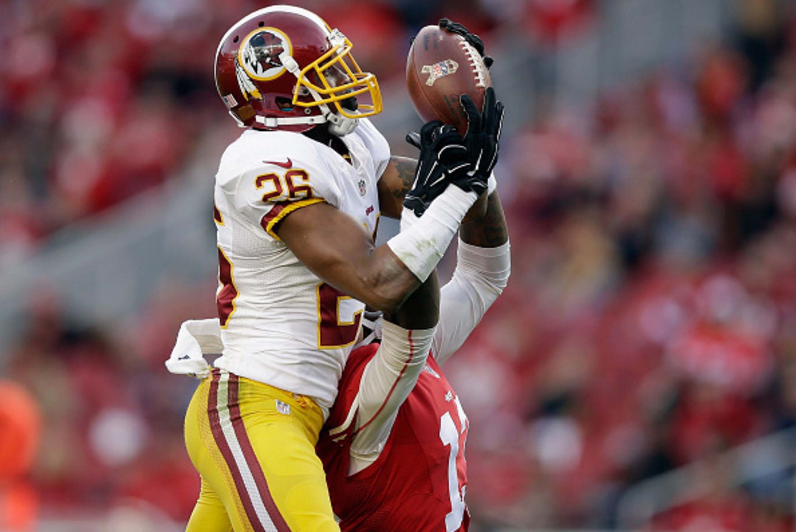 SANTA CLARA, CA - NOVEMBER 23: Bashaud Breeland #26 of the Washington Redskins breaks up a pass intended for Steve Johnson #13 of the San Francisco 49ers in the third quarter at Levi's Stadium on November 23, 2014 in Santa Clara, California.  (Photo by Ez