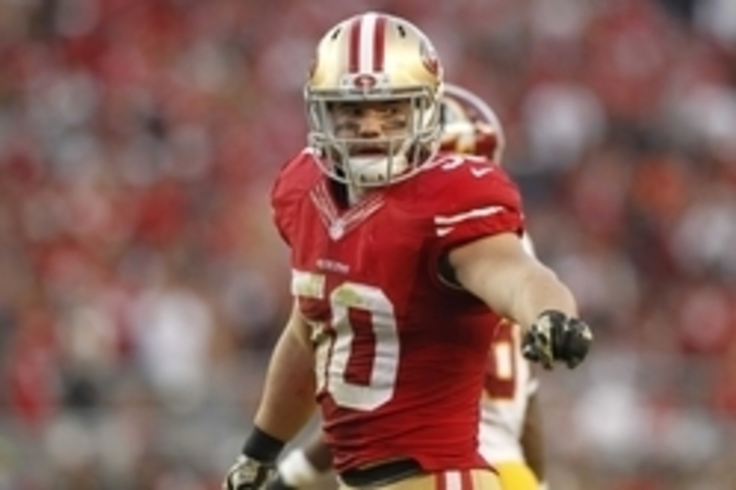 Nov 23, 2014; Santa Clara, CA, USA; San Francisco 49ers inside linebacker Chris Borland (50) stands on the field against the Washington Redskins in the fourth quarter at Levi's Stadium. The 49ers defeated the Redskins 17-13. Mandatory Credit: Cary Edmonds