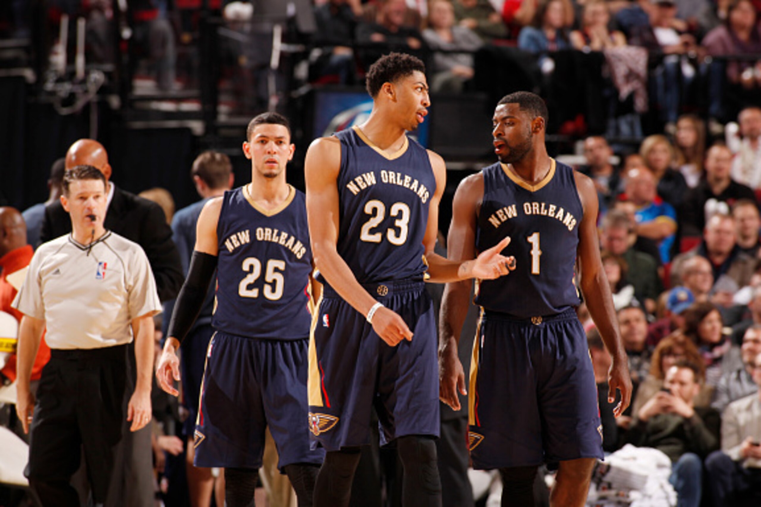 PORTLAND, OR - NOVEMBER 17: Anthony Davis #23, Tyreke Evans #1 and Austin Rivers #25 of the New Orleans Pelicans during the game on November 17, 2014 at the Moda Center Arena in Portland, Oregon. NOTE TO USER: User expressly acknowledges and agrees that, 