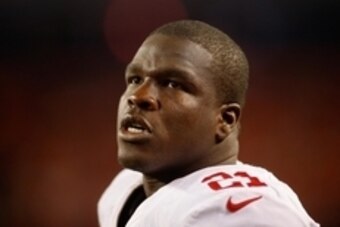 Oct 19, 2014; Denver, CO, USA; San Francisco 49ers running back Frank Gore (21) during the game against the Denver Broncos at Sports Authority Field at Mile High. Mandatory Credit: Chris Humphreys-USA TODAY Sports