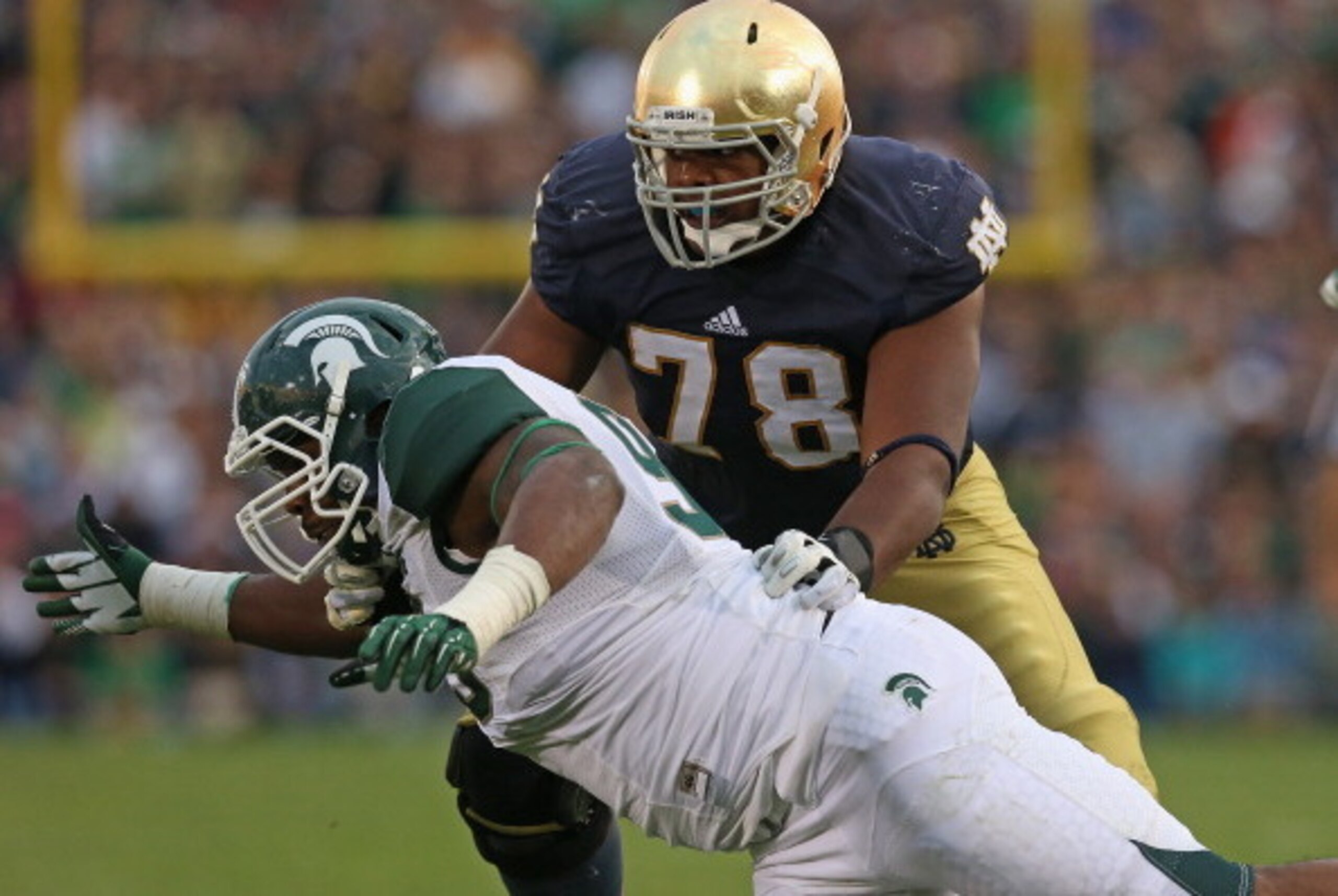 SOUTH BEND, IN - SEPTEMBER 21:  Damon Knox #93 of the Michigan State Spartans rushes against Ronnie Stanley #78 of the Notre Dame Fighting Irish at Notre Dame Stadium on September 21, 2013 in South Bend, Indiana. Notre Dame defeated Michigan State 17-13. 