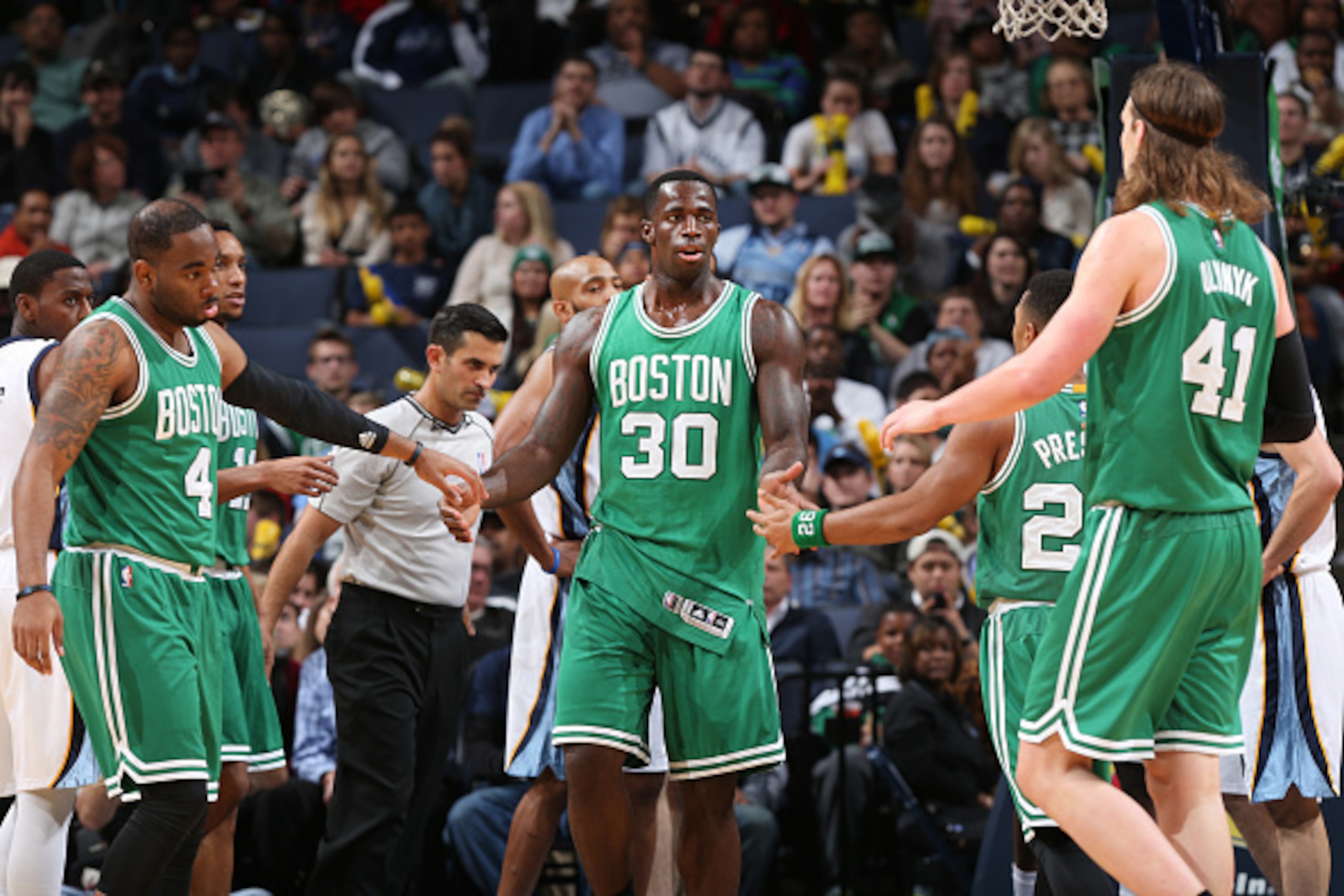 MEMPHIS, TN -  NOVEMBER 21: Brandon Bass #30 of the Boston Celtics high fives teammates during the game against the Memphis Grizzlies on November 21, 2014 at FedExForum in Memphis,Tennessee. NOTE TO USER: User expressly acknowledges and agrees that, by do