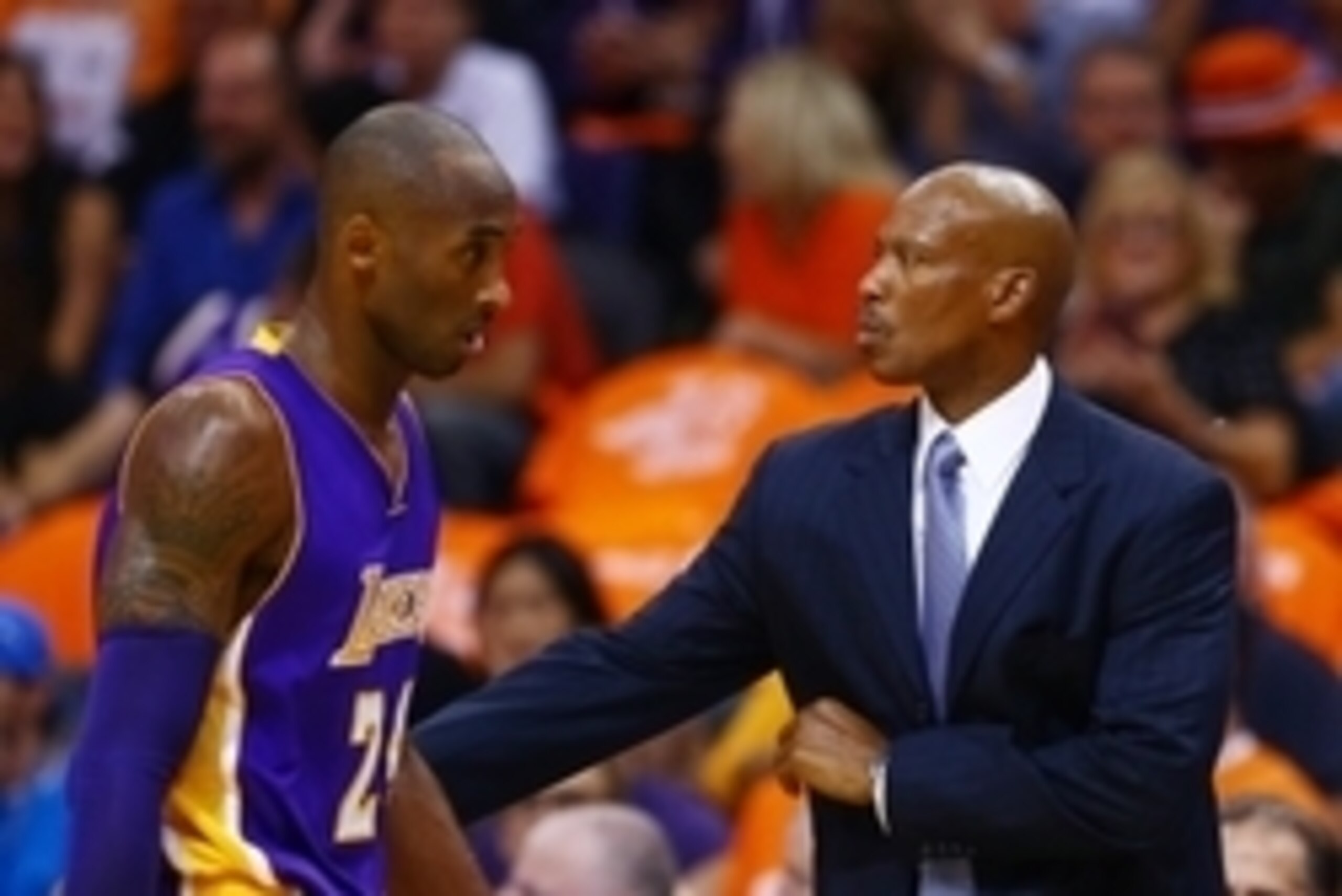 Oct 29, 2014; Phoenix, AZ, USA; Los Angeles Lakers head coach Byron Scott (right) with guard Kobe Bryant in the first half against the Phoenix Suns during the home opener at US Airways Center. The Suns defeated the Lakers 119-99. Mandatory Credit: Mark J.