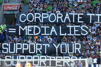 MELBOURNE, AUSTRALIA - MARCH 03:  Victory fans hold up signs in protest during the round 23 A-League match between the Melbourne Victory and the Newcastle Jets at AAMI Park on March 3, 2013 in Melbourne, Australia.  (Photo by Quinn Rooney/Getty Images)
