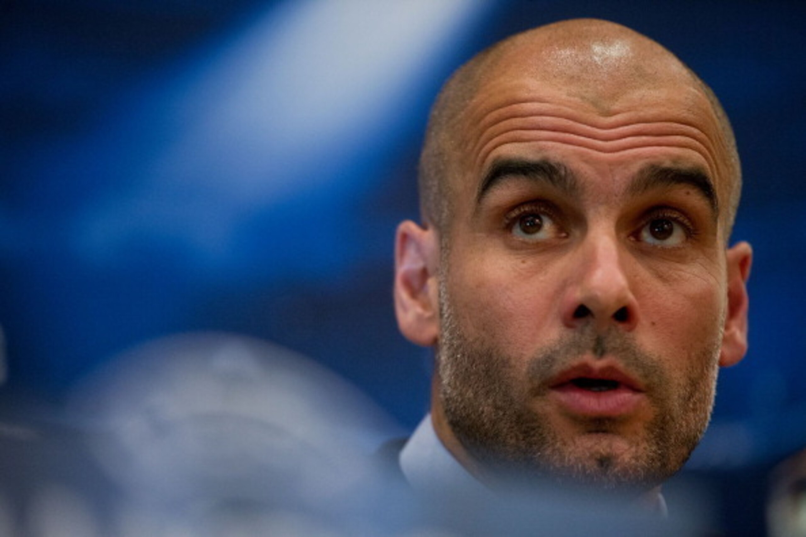 MADRID, SPAIN - APRIL 22: Coach Pep Guardiola of FC Bayern Munich attends a press conference, on the eve of the UEFA Champions League semi-final first leg match against Real Madrid CF, at Intercontinental Hotel on April 22, 2014 in Madrid, Spain. (Photo MADRID, SPAIN - APRIL 22: Coach Pep Guardiola of FC Bayern Munich attends a press conference, on the eve of the UEFA Champions League semi-final first leg match against Real Madrid CF, at Intercontinental Hotel on April 22, 2014 in Madrid, Spain. (Photo