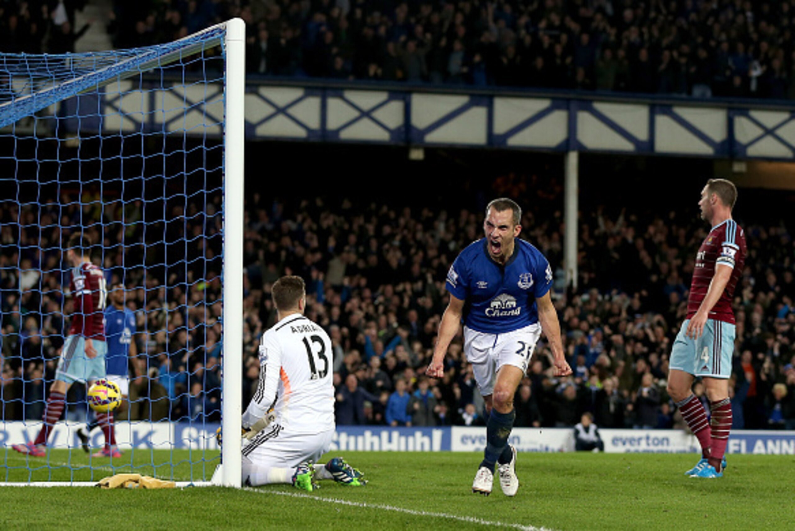 LIVERPOOL, ENGLAND - NOVEMBER 22: Leon Osman of Everton celebrates scoring his side's second goal during the Barclays Premier League match between Everton and West Ham United at Goodison Park on November 22, 2014 in Liverpool, England. (Photo by Chris Bru