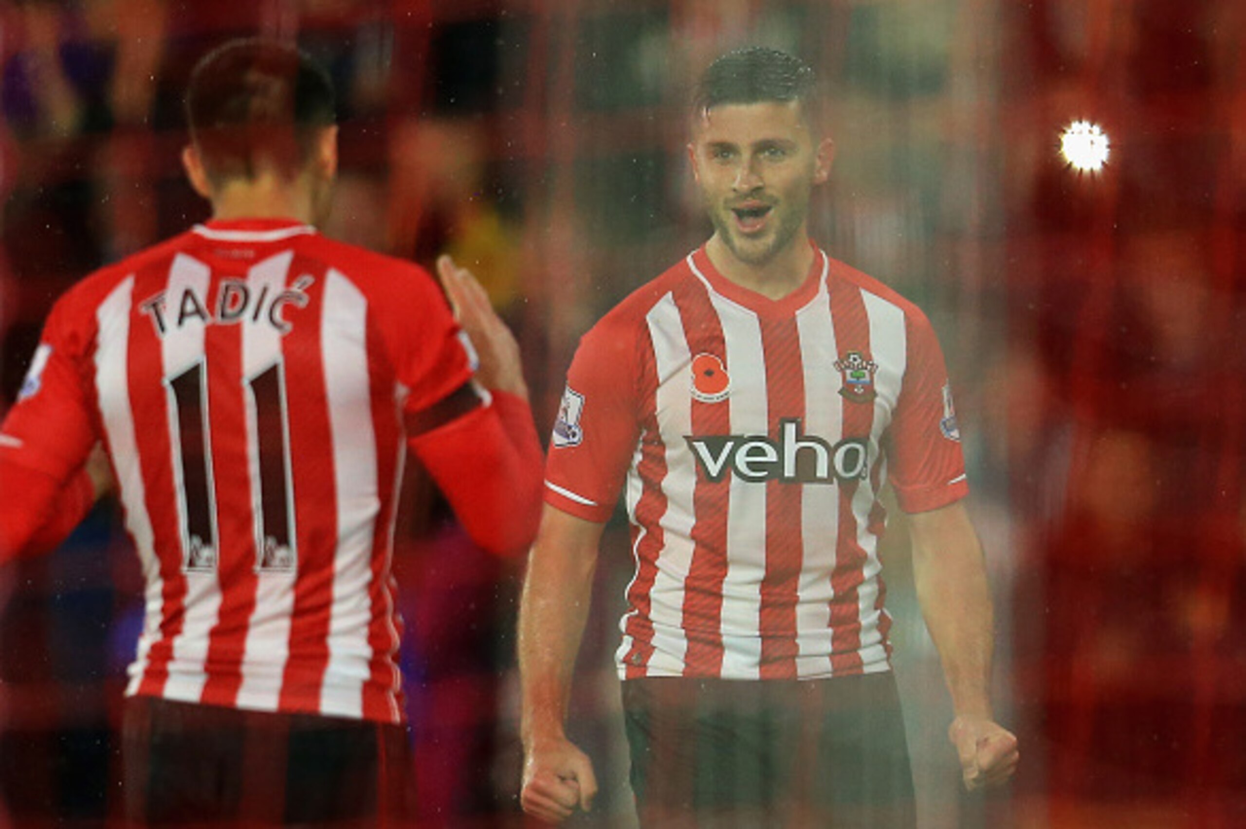 SOUTHAMPTON, ENGLAND - NOVEMBER 08: Shane Long of Southampton celebrates scoring a goal with Dusan Tadic of Southampton during the Barclays Premier League match between Southampton and Leicester City at St Mary's Stadium on November 8, 2014 in Southampt SOUTHAMPTON, ENGLAND - NOVEMBER 08: Shane Long of Southampton celebrates scoring a goal with Dusan Tadic of Southampton during the Barclays Premier League match between Southampton and Leicester City at St Mary's Stadium on November 8, 2014 in Southampt