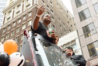 SAN FRANCISCO, CA - OCTOBER 31: Pablo Sandoval #48 of the San Francisco Giants, waves to the crowd along the parade route during the San Francisco Giants World Series victory parade on October 31, 2014 in San Francisco, California. The San Francisco Giant