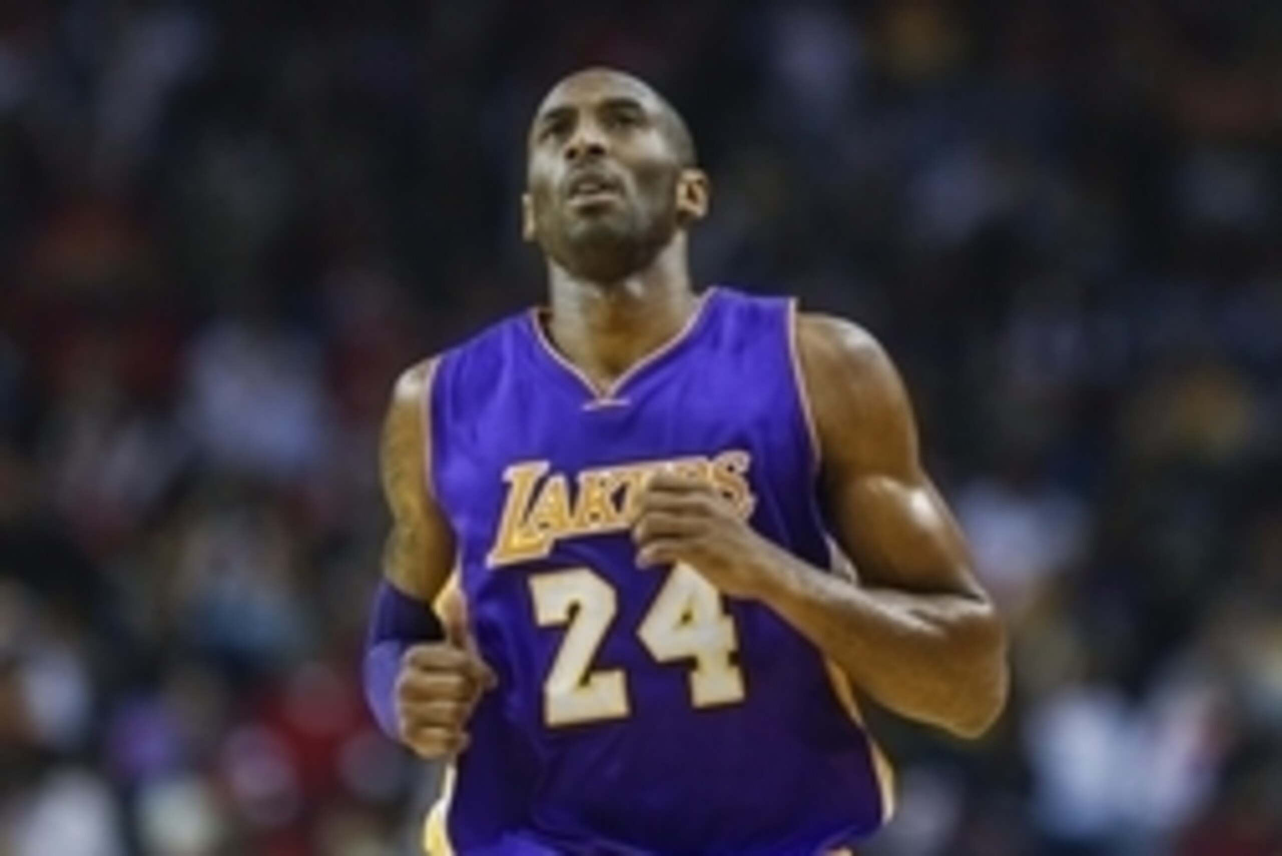 Nov 19, 2014; Houston, TX, USA; Los Angeles Lakers guard Kobe Bryant (24) reacts after a play during the first quarter against the Houston Rockets at Toyota Center. Mandatory Credit: Troy Taormina-USA TODAY Sports
