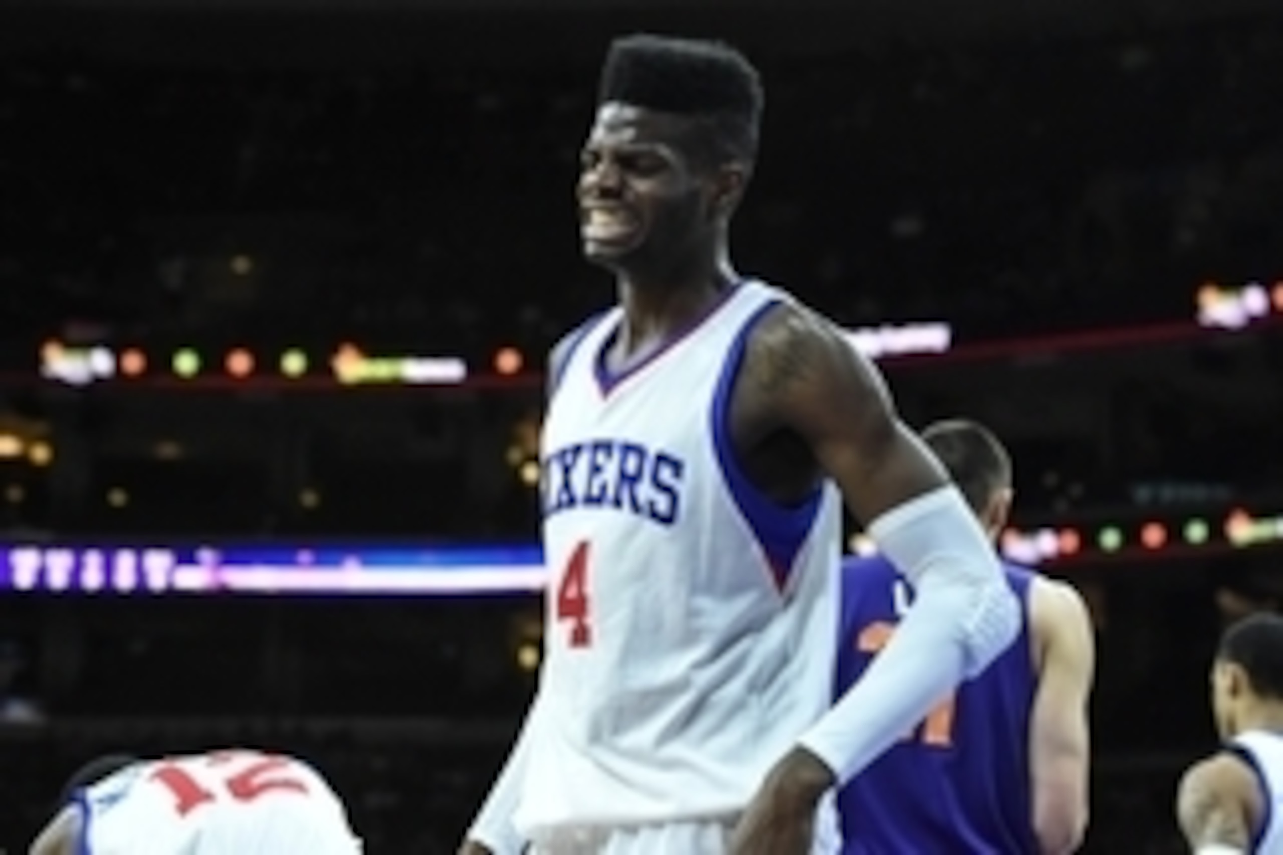 Nov 21, 2014; Philadelphia, PA, USA; Philadelphia 76ers forward Nerlens Noel (4) reacts to a foul call during the first quarter of the game against the Phoenix Suns at the Wells Fargo Center. Mandatory Credit: John Geliebter-USA TODAY Sports