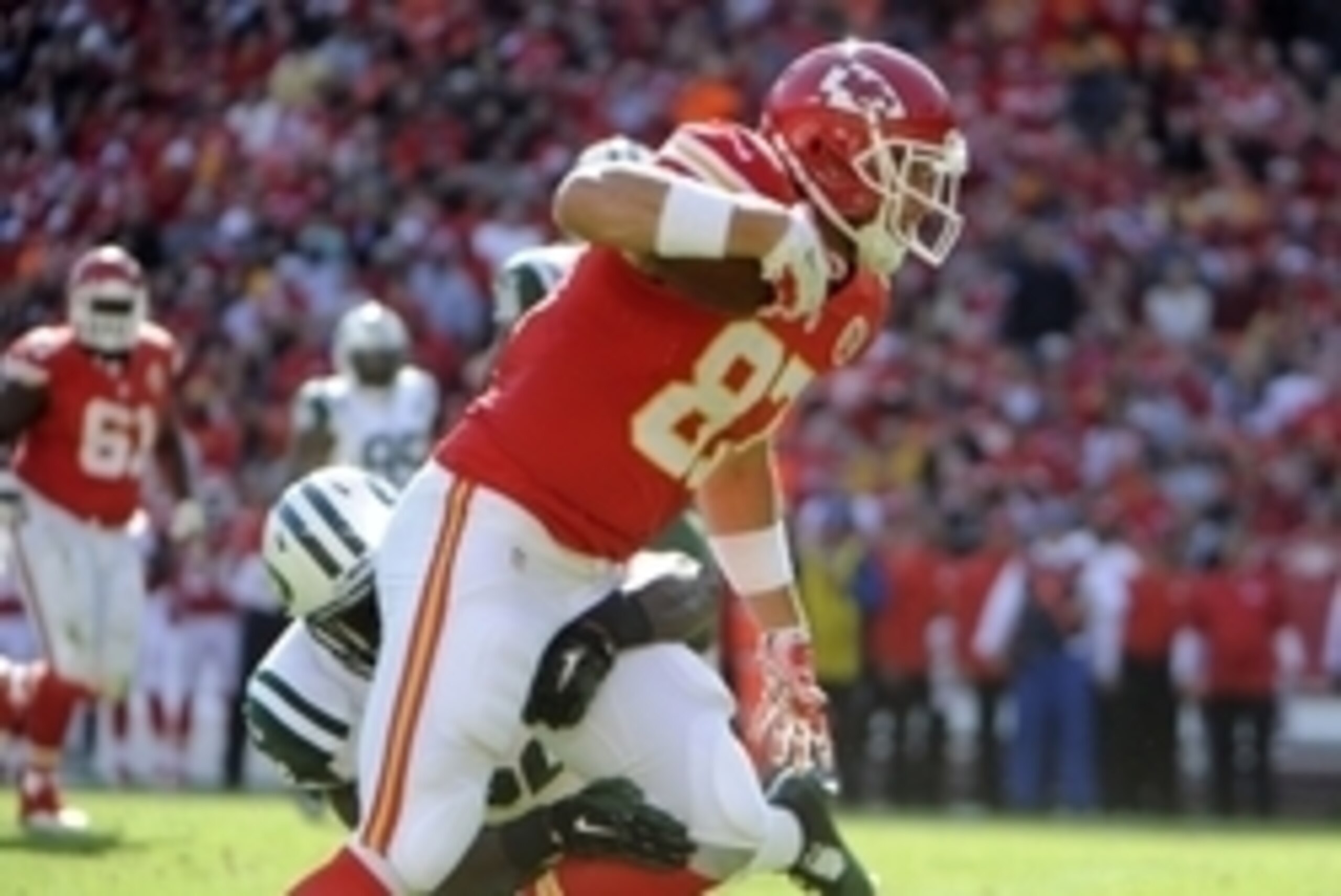 Nov 2, 2014; Kansas City, MO, USA; Kansas City Chiefs tight end Travis Kelce (87) is tackled by New York Jets inside linebacker David Harris (52) in the second half at Arrowhead Stadium. Kansas City won the game 24-10. Mandatory Credit: John Rieger-USA TO