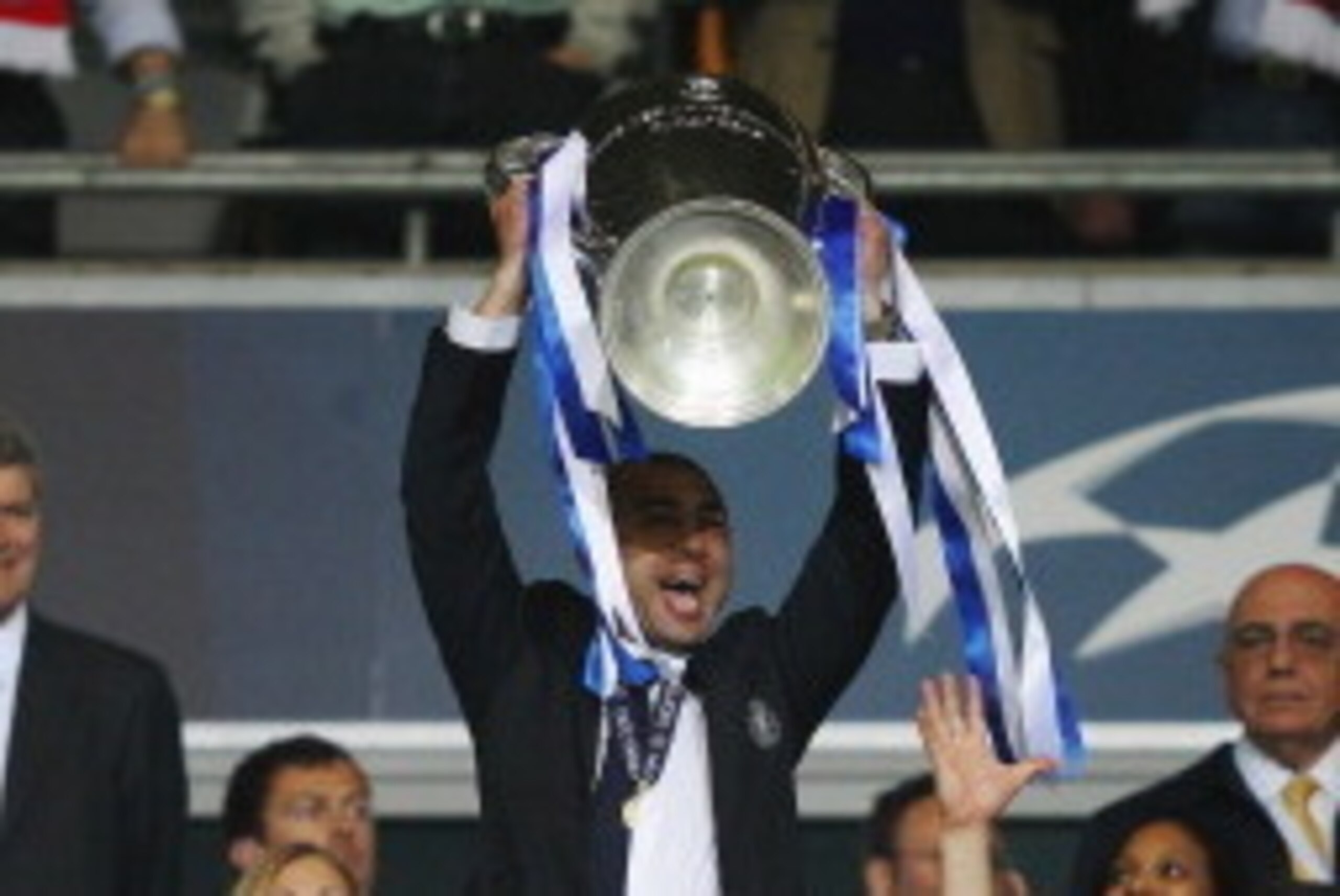 MUNICH, GERMANY - MAY 19: Roberto Di Matteo interim manager of Chelsea lifts the trophy in celebration after their victory in the UEFA Champions League Final between FC Bayern Muenchen and Chelsea at the Fussball Arena München on May 19, 2012 in Munich, MUNICH, GERMANY - MAY 19: Roberto Di Matteo interim manager of Chelsea lifts the trophy in celebration after their victory in the UEFA Champions League Final between FC Bayern Muenchen and Chelsea at the Fussball Arena München on May 19, 2012 in Munich,