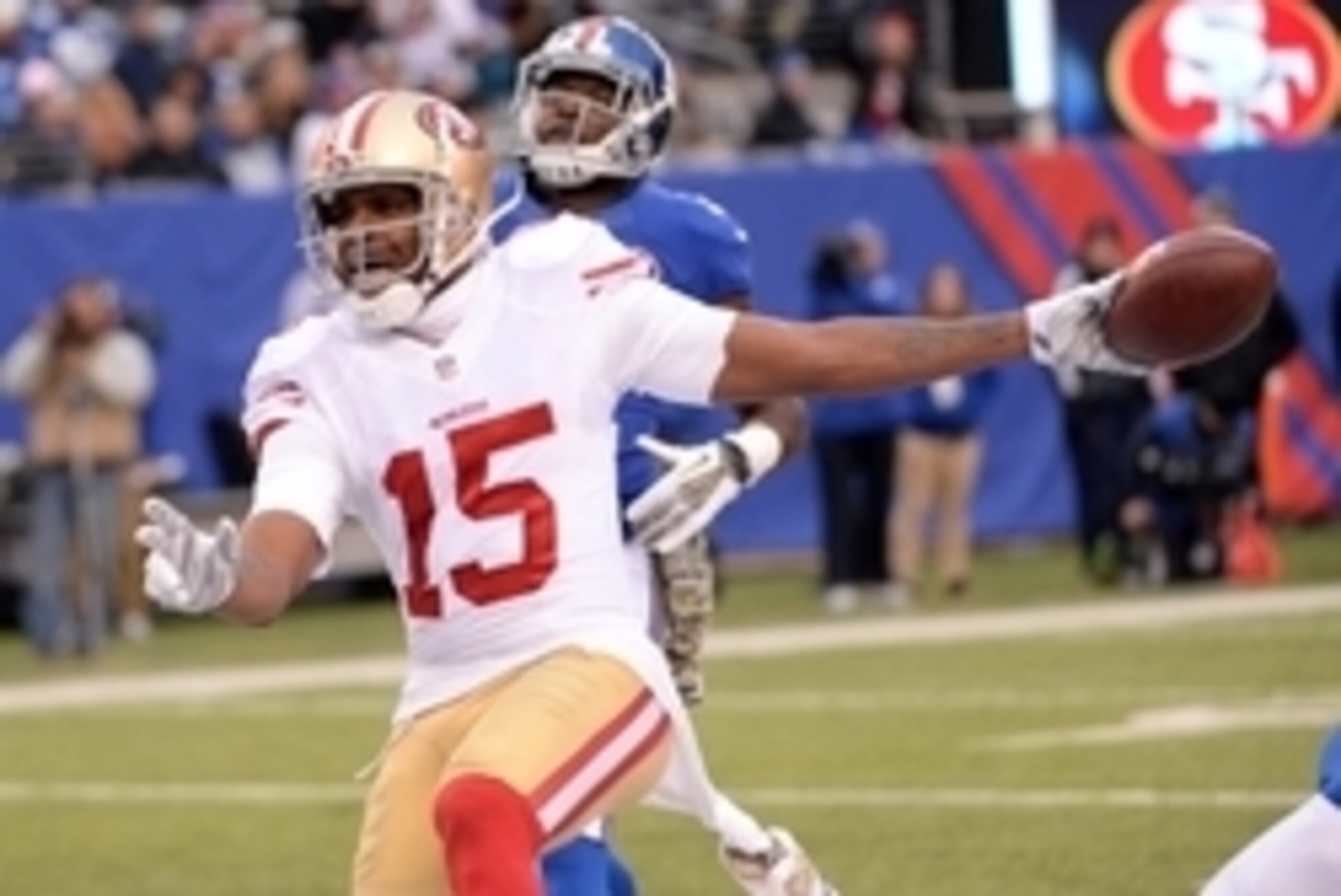 Nov 16, 2014; East Rutherford, NJ, USA; San Francisco 49ers wide receiver Michael Crabtree (15) scores the game winning touchdown during the second half against the New York Giantsat MetLife Stadium. Mandatory Credit: Robert Deutsch-USA TODAY Sports