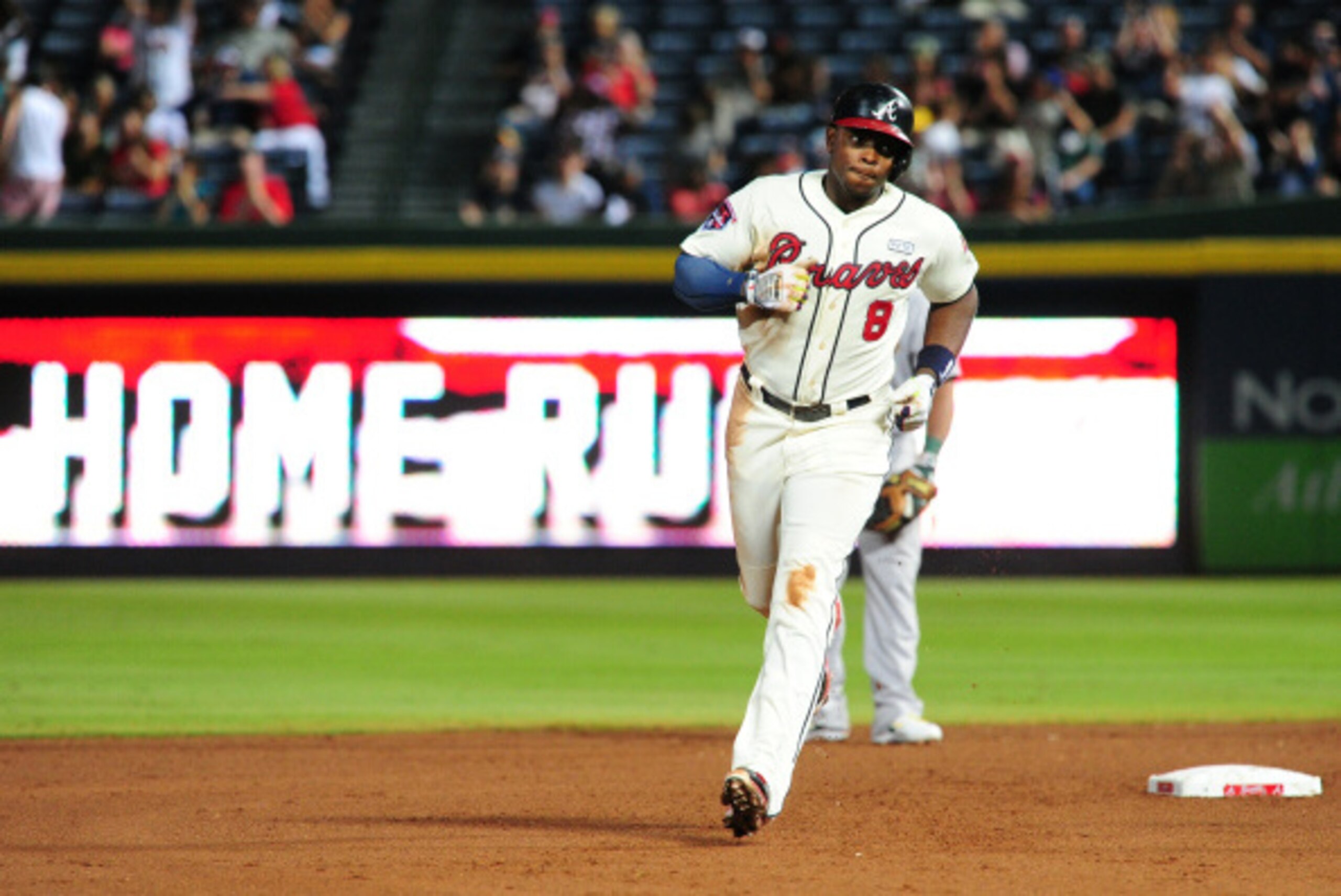 ATLANTA, GA - AUGUST 17: Justin Upton #8 of the Atlanta Braves rounds the bases after hitting a fourth inning two-run home run against the Oakland Athletics at Turner Field on August 17, 2014 in Atlanta, Georgia. (Photo by Scott Cunningham/Getty Images)
