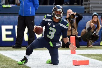 SEATTLE, WA - NOVEMBER 23:   Russell Wilson #3 of the Seattle Seahawks reacts after a touchdown attempt was called back due to a penalty in the first half during their game against the Arizona Cardinals at CenturyLink Field on November 23, 2014 in Seattle