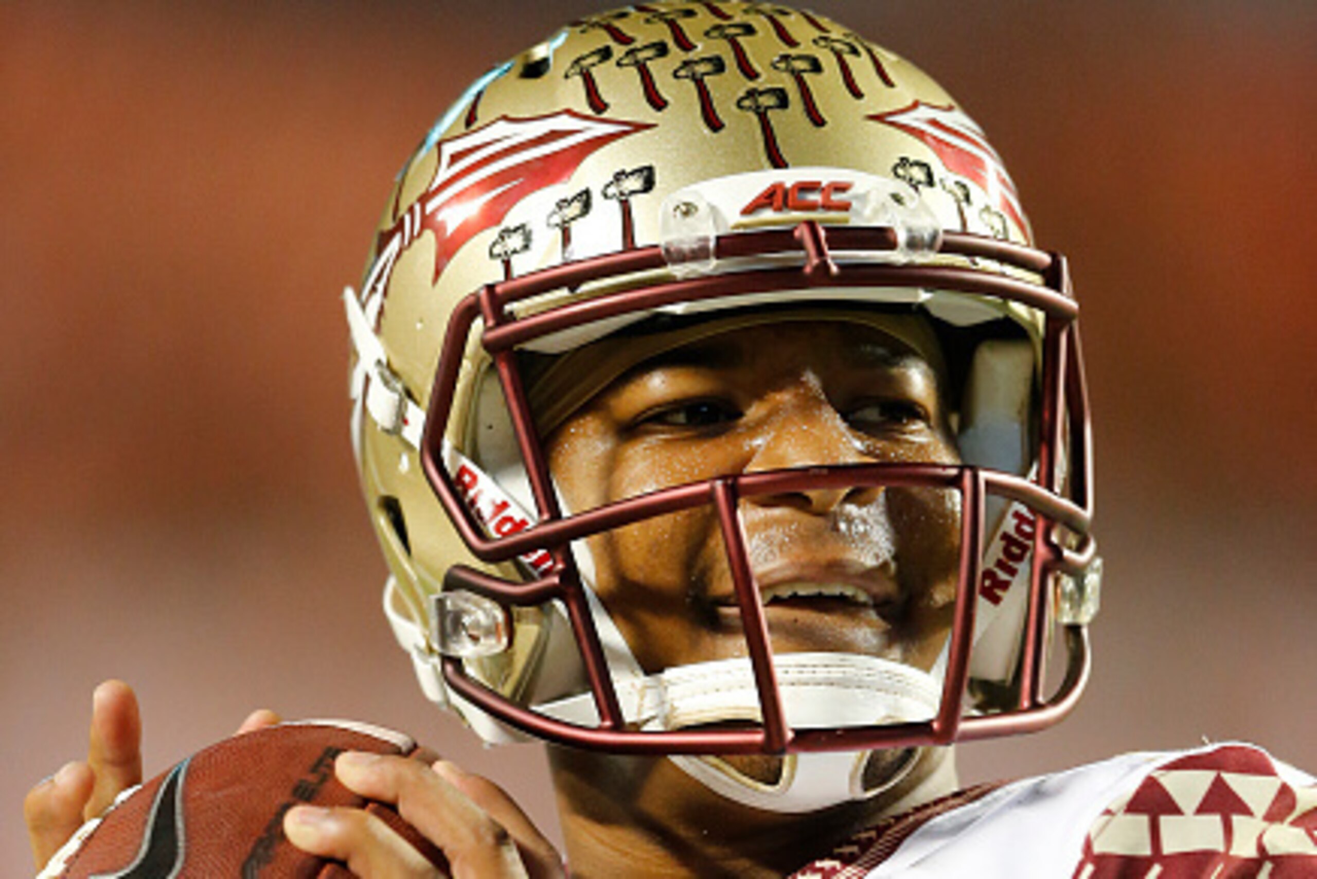 MIAMI GARDENS, FL - NOVEMBER 15: Jameis Winston #5 of the Florida State Seminoles throws the ball prior to the game against the Miami Hurricanes on November 15, 2014 at Sun Life Stadium in Miami Gardens, Florida. (Photo by Joel Auerbach/Getty Images)