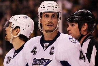 BOSTON, MA - MAY 17:  Vincent Lecavalier #4 of the Tampa Bay Lightning looks on in Game Two of the Eastern Conference Finals against the Boston Bruins during the 2011 NHL Stanley Cup Playoffs at TD Garden on May 17, 2011 in Boston, Massachusetts.  (Photo 