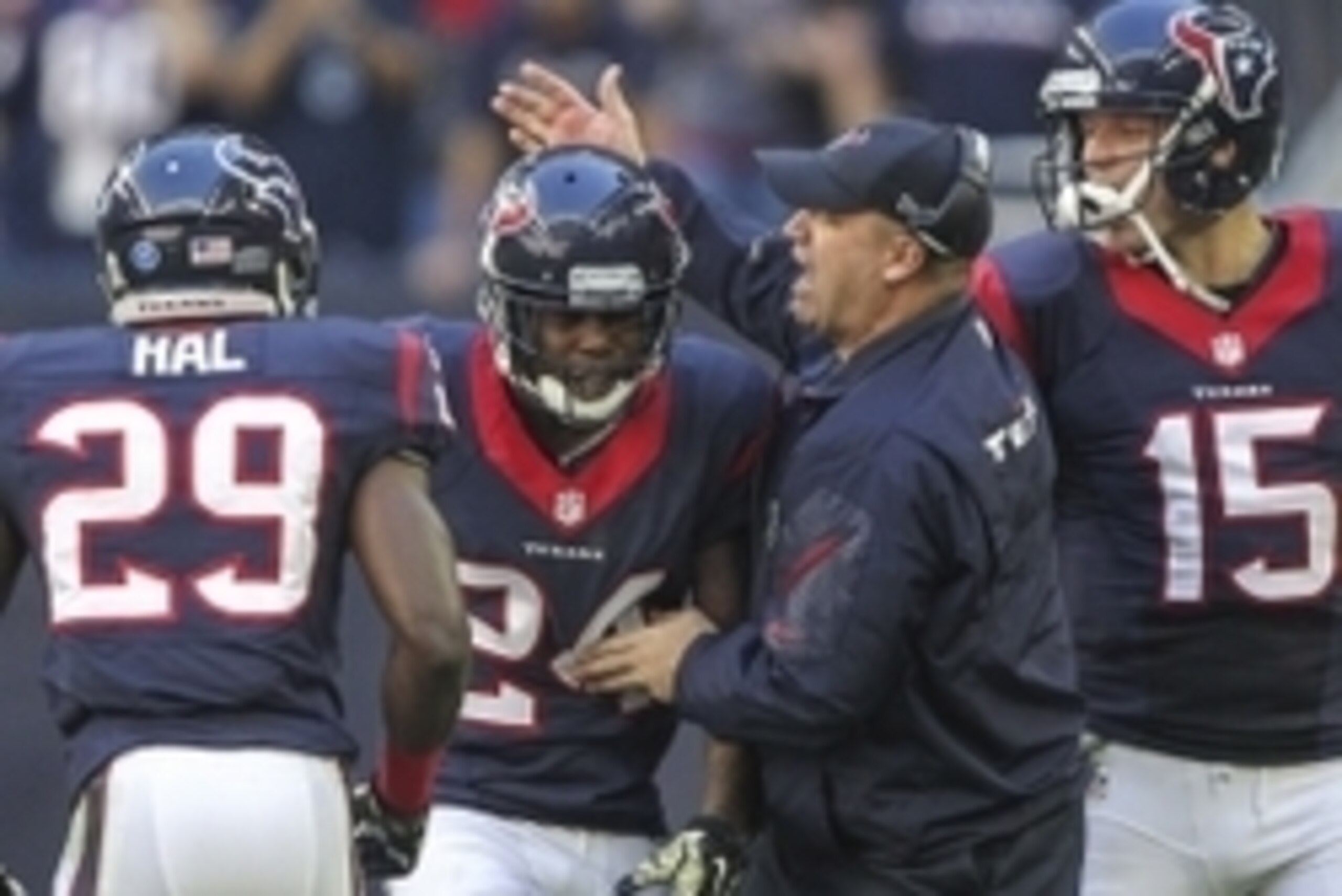 Nov 23, 2014; Houston, TX, USA; Houston Texans head coach Bill O'Brien congratulates cornerback Johnathan Joseph (24) after Joseph returns an interception for a touchdown during the third quarter against the Cincinnati Bengals at NRG Stadium. The Bengals 