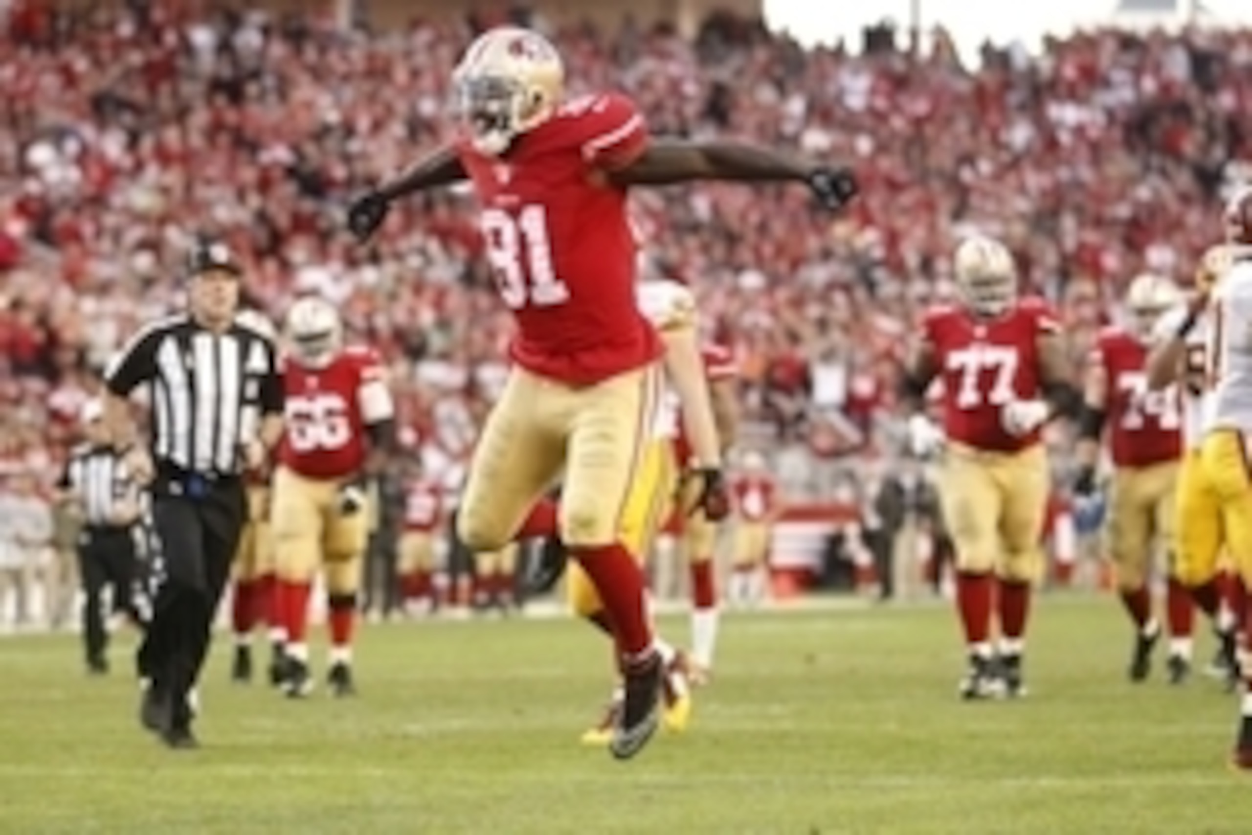 Nov 23, 2014; Santa Clara, CA, USA; San Francisco 49ers wide receiver Anquan Boldin (81) reacts after catching a pass for a first down against the Washington Redskins in the fourth quarter at Levi's Stadium. The 49ers defeated the Redskins 17-13. Mandator