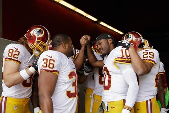 SANTA CLARA, CA - NOVEMBER 23: Robert Griffin III #10 of the Washington Redskins rallies his team before the game at Levi's Stadium on November 23, 2014 in Santa Clara, California.  (Photo by Ezra Shaw/Getty Images)