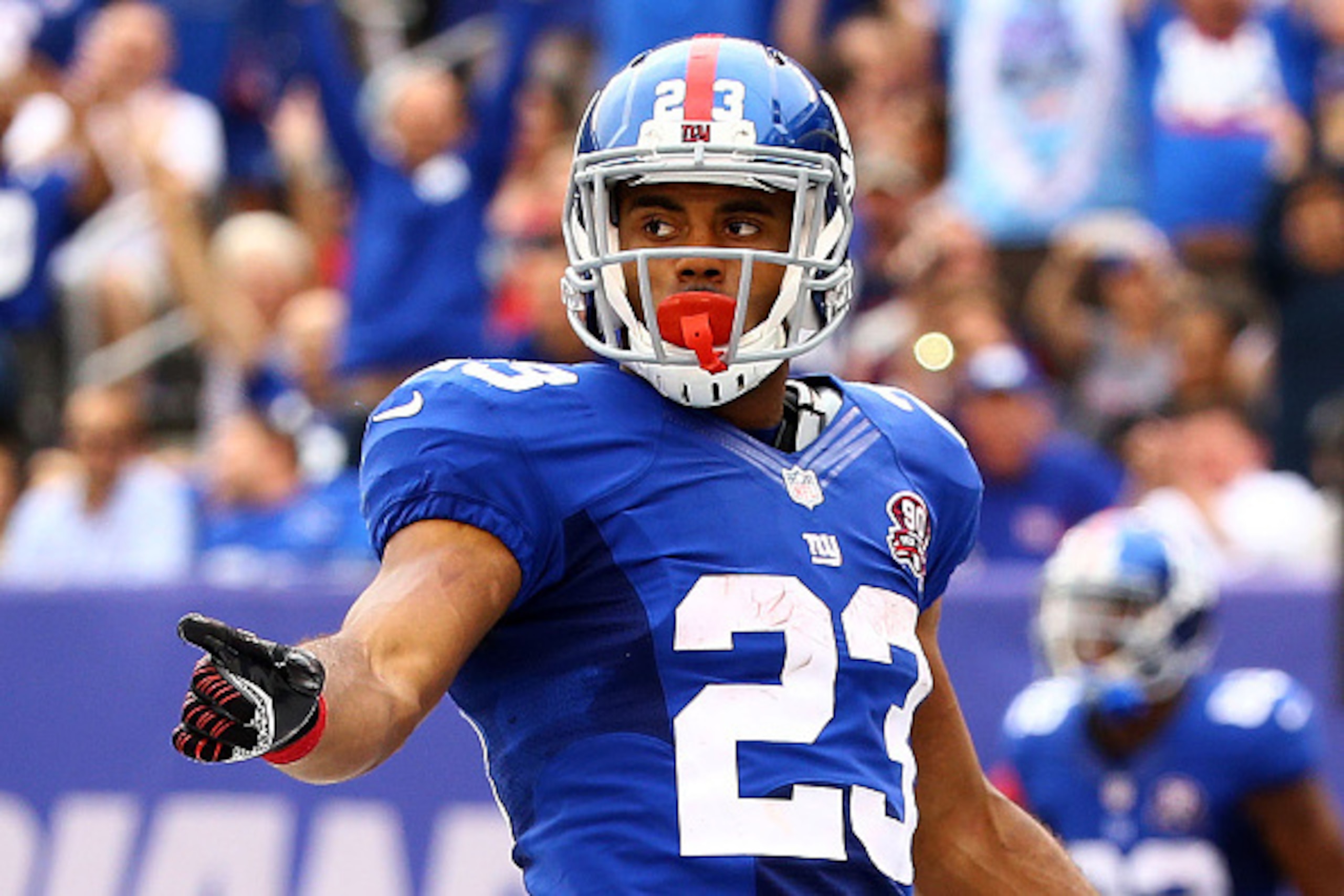 EAST RUTHERFORD, NJ - SEPTEMBER 21:  Rashad Jennings #23 of the New York Giants celebrates a touchdown in the second quarter against the Houston Texans at MetLife Stadium on September 21, 2014 in East Rutherford, New Jersey.  (Photo by Al Bello/Getty Imag
