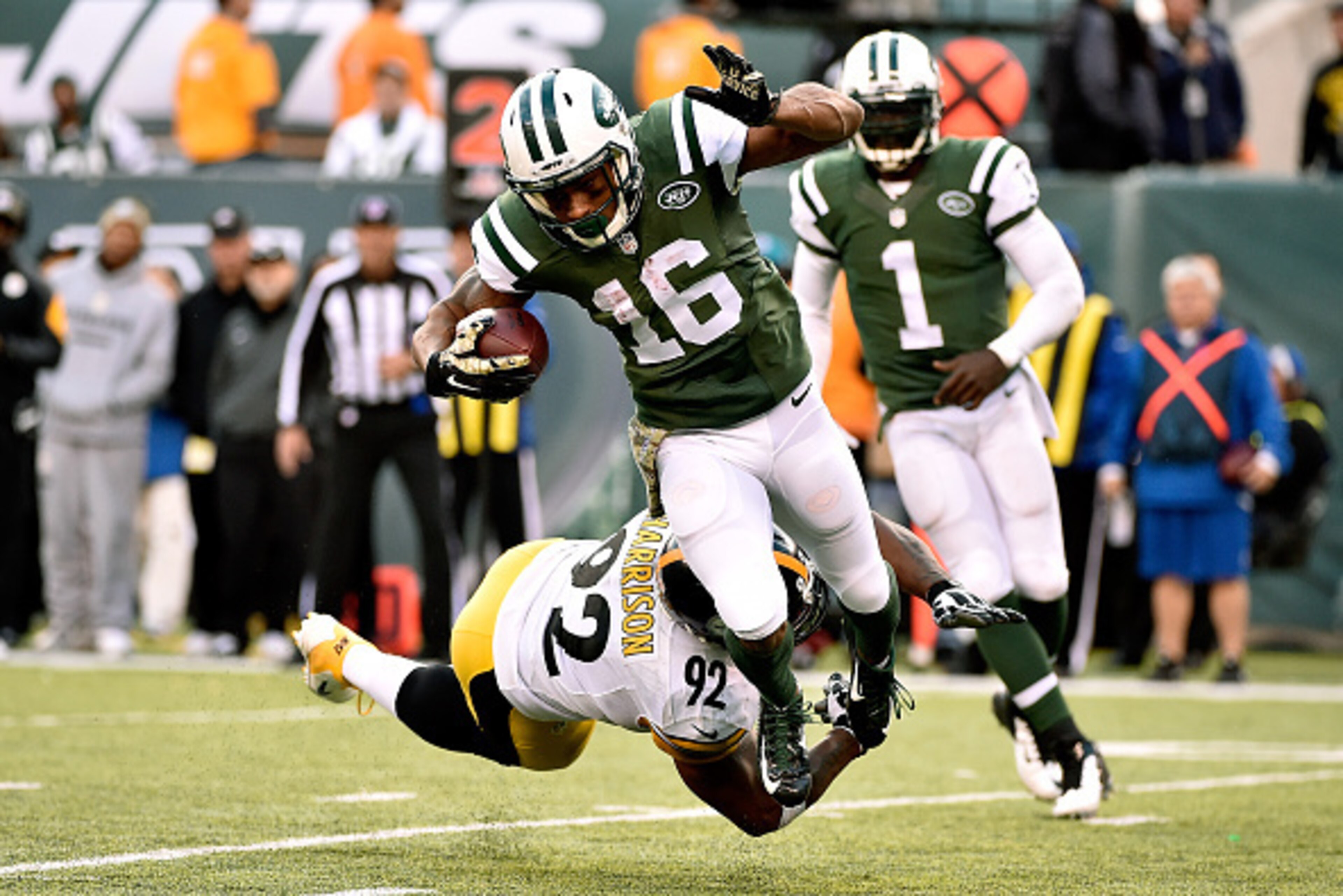 EAST RUTHERFORD, NJ - NOVEMBER 09: Wide receiver Percy Harvin #16 of the New York Jets is tackled by linebacker James Harrison #92 of the Pittsburgh Steelers during a game at MetLife Stadium on November 9, 2014 in East Rutherford, New Jersey.  (Photo by A