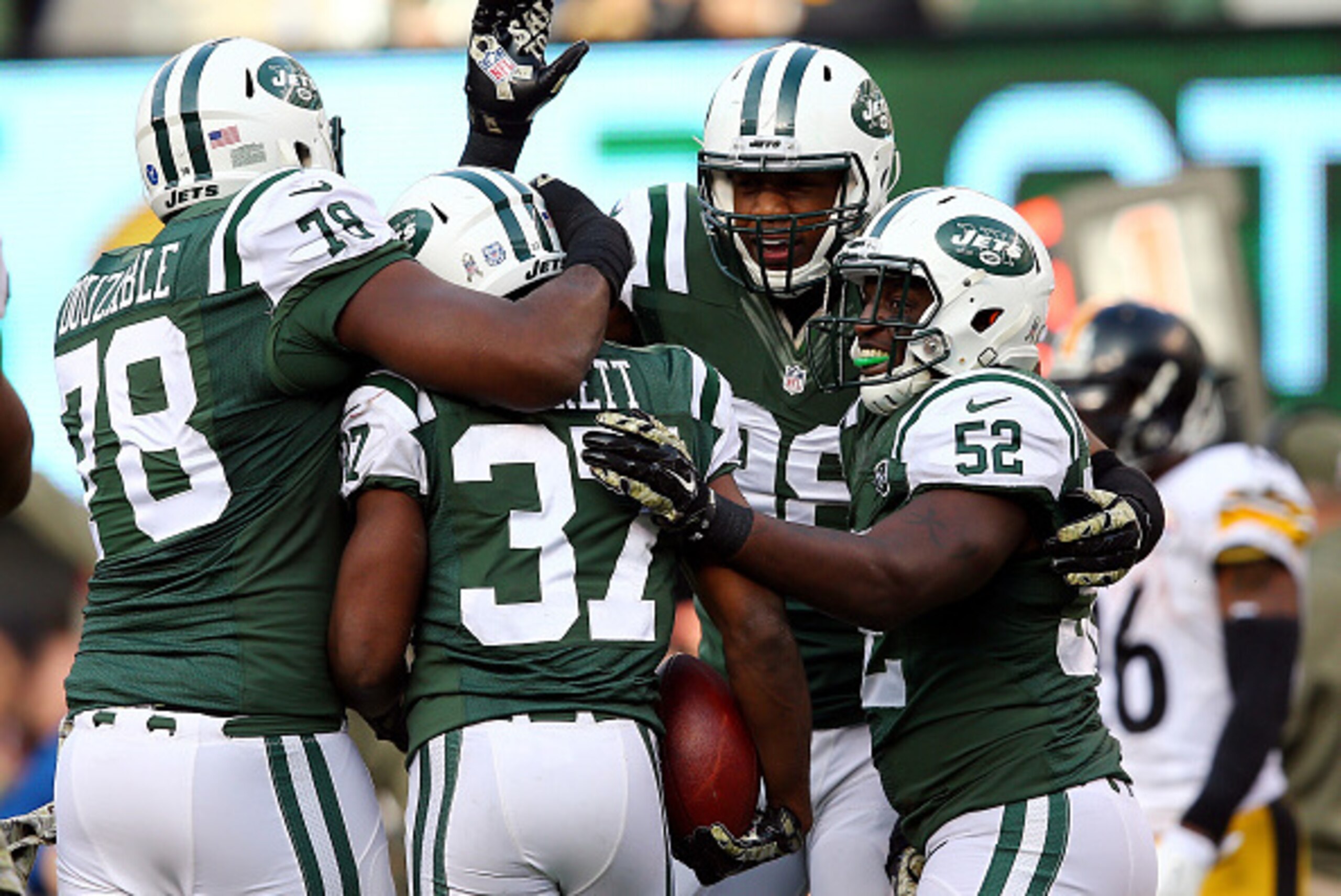EAST RUTHERFORD, NJ - NOVEMBER 09: Free safety Jaiquawn Jarrett #37 of the New York Jets celebrates after an interception against the Pittsburgh Steelers during a game at MetLife Stadium on November 9, 2014 in East Rutherford, New Jersey.  (Photo by Elsa/