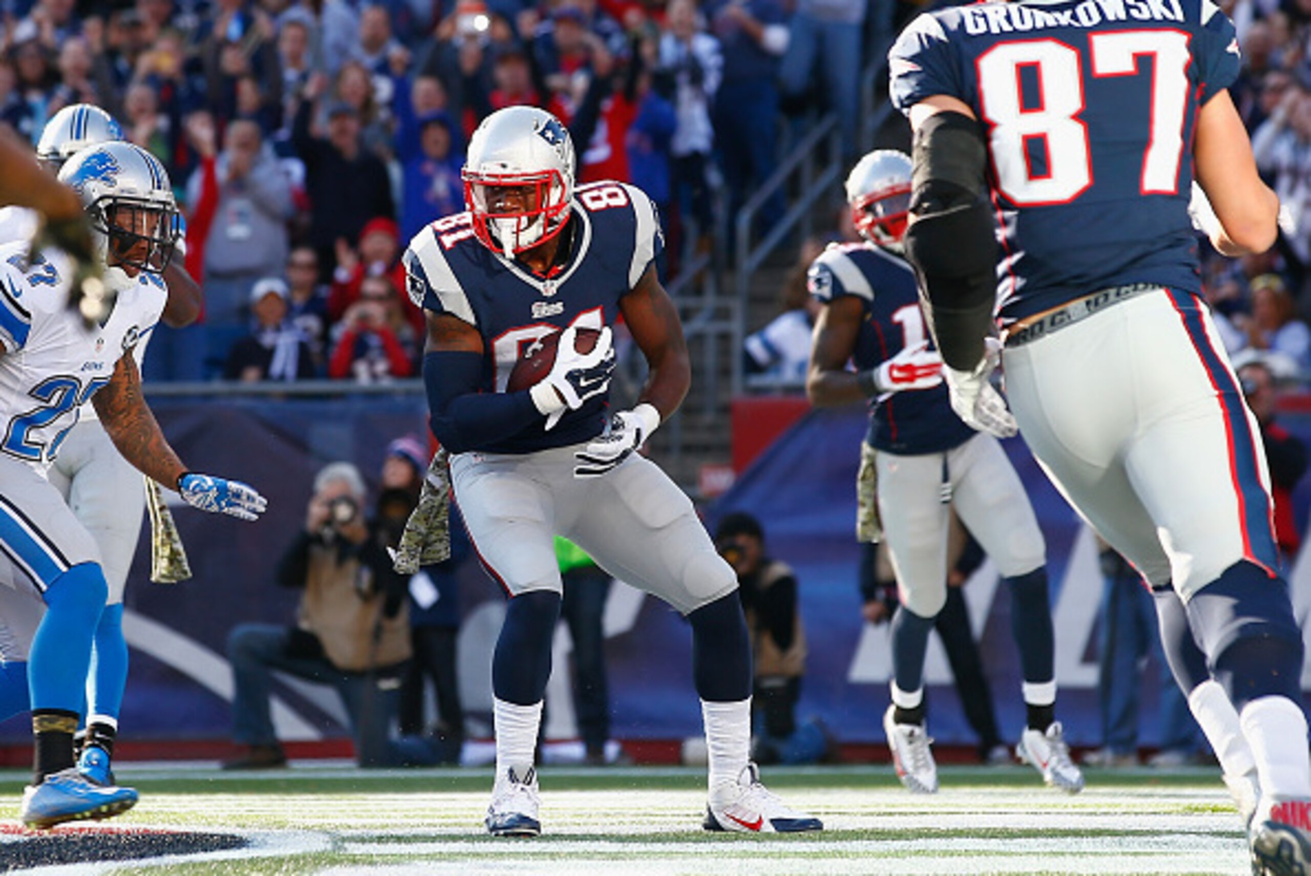 FOXBORO, MA - NOVEMBER 23: Tim Wright #81 of the New England Patriots catches a touchdown pass during the first quarter against the Detroit Lions at Gillette Stadium on November 23, 2014 in Foxboro, Massachusetts. (Photo by Jared Wickerham/Getty Images) FOXBORO, MA - NOVEMBER 23: Tim Wright #81 of the New England Patriots catches a touchdown pass during the first quarter against the Detroit Lions at Gillette Stadium on November 23, 2014 in Foxboro, Massachusetts. (Photo by Jared Wickerham/Getty Images)