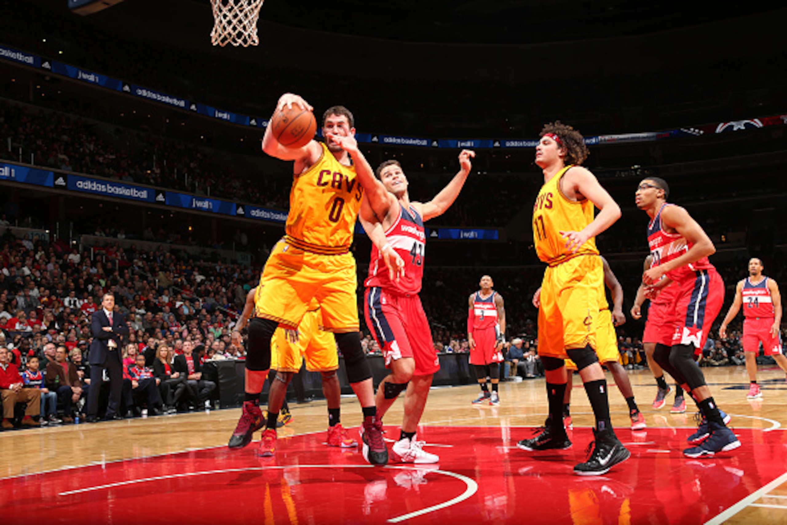 WASHINGTON, DC -  NOVEMBER 21: Kevin Love #0 of the Cleveland Cavaliers rebounds the ball against the Washington Wizards during the game on November 21, 2014 at Verizon Center in Washington, DC. NOTE TO USER: User expressly acknowledges and agrees that, b