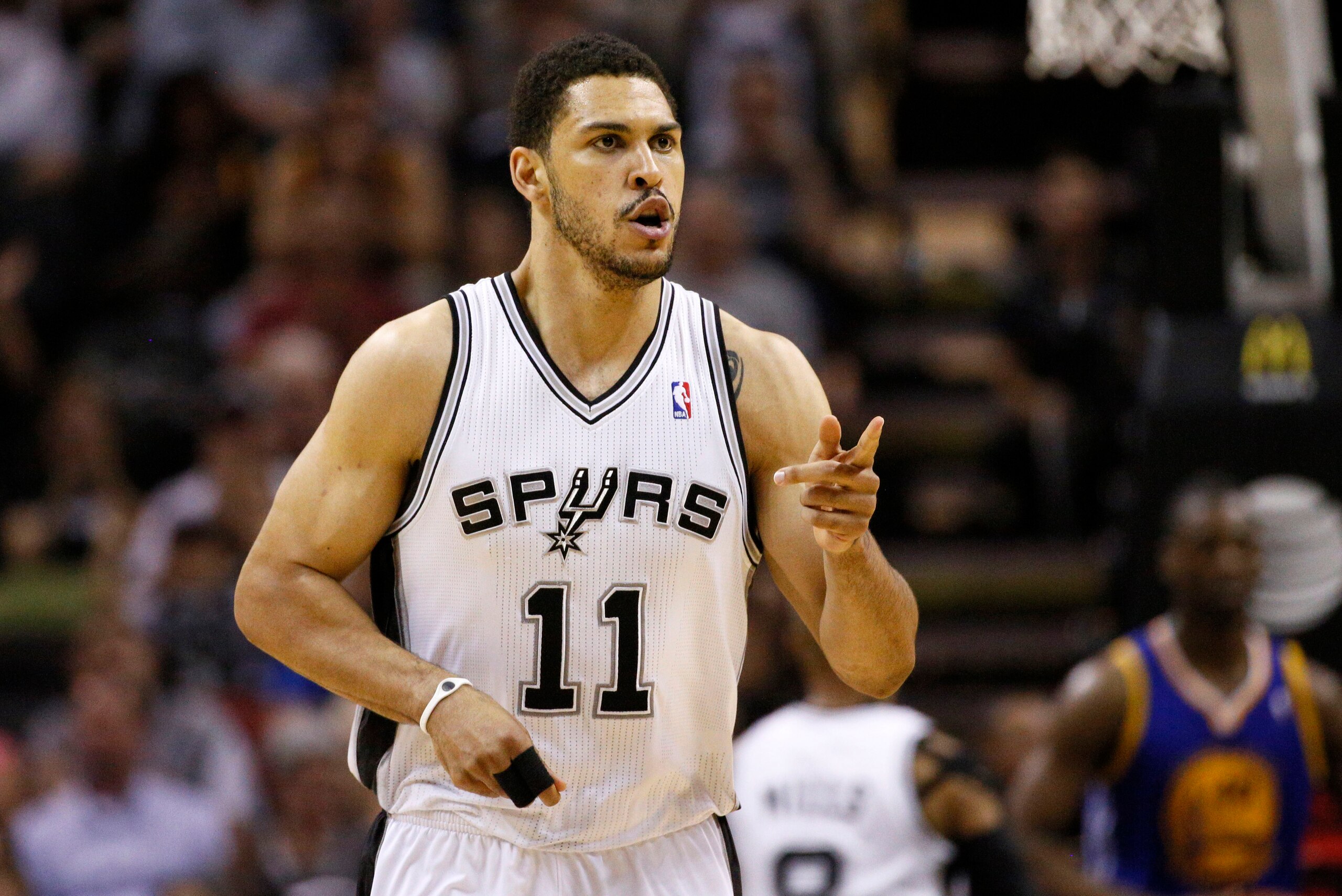 Apr 2, 2014; San Antonio, TX, USA; San Antonio Spurs forward Jeff Ayres (11) reacts after a shot against the Golden State Warriors during the second half at AT&T Center. The Spurs won 111-90. Mandatory Credit: Soobum Im-USA TODAY Sports