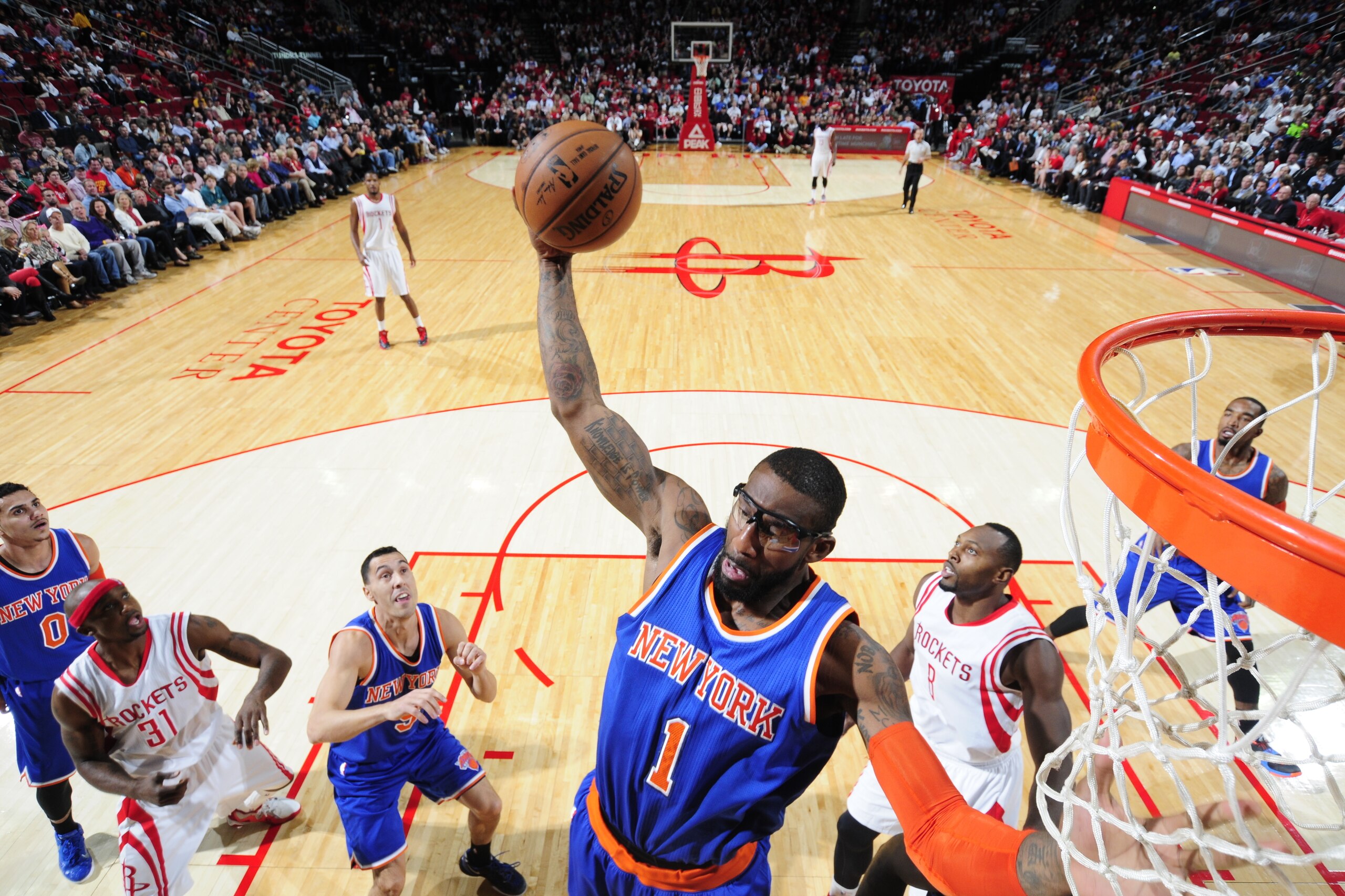 HOUSTON, TX - NOVEMBER 24:  Amar'e Stoudemire #1 of the New York Knicks grabs the rebound against the Houston Rockets during the game on November 24, 2014 at the Toyota Center in Houston, Texas. NOTE TO USER: User expressly acknowledges and agrees that, b