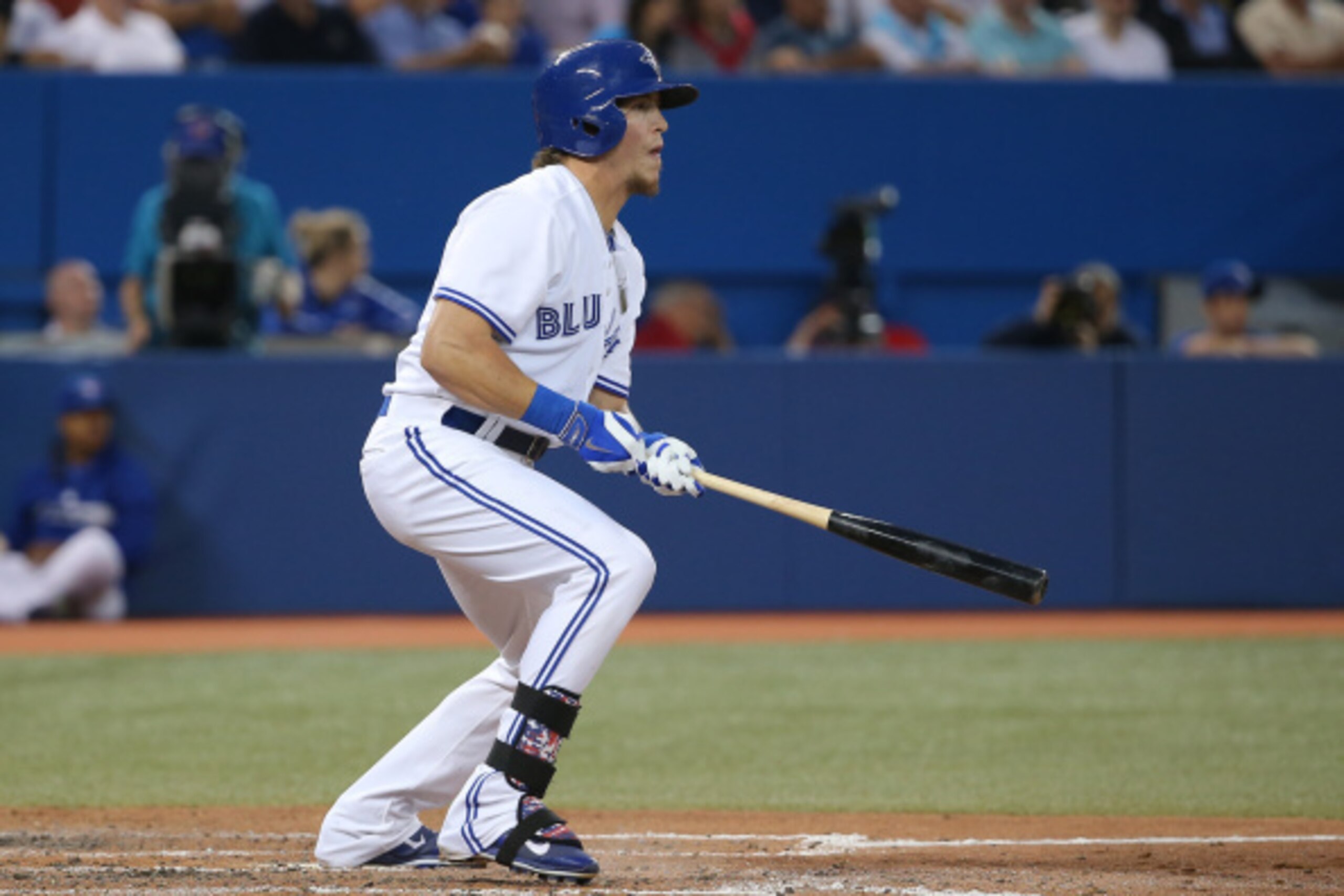 TORONTO, CANADA - AUGUST 7: Colby Rasmus #28 of the Toronto Blue Jays hits a double in the fourth inning during MLB game action against the Baltimore Orioles on August 7, 2014 at Rogers Centre in Toronto, Ontario, Canada. (Photo by Tom Szczerbowski/Getty 