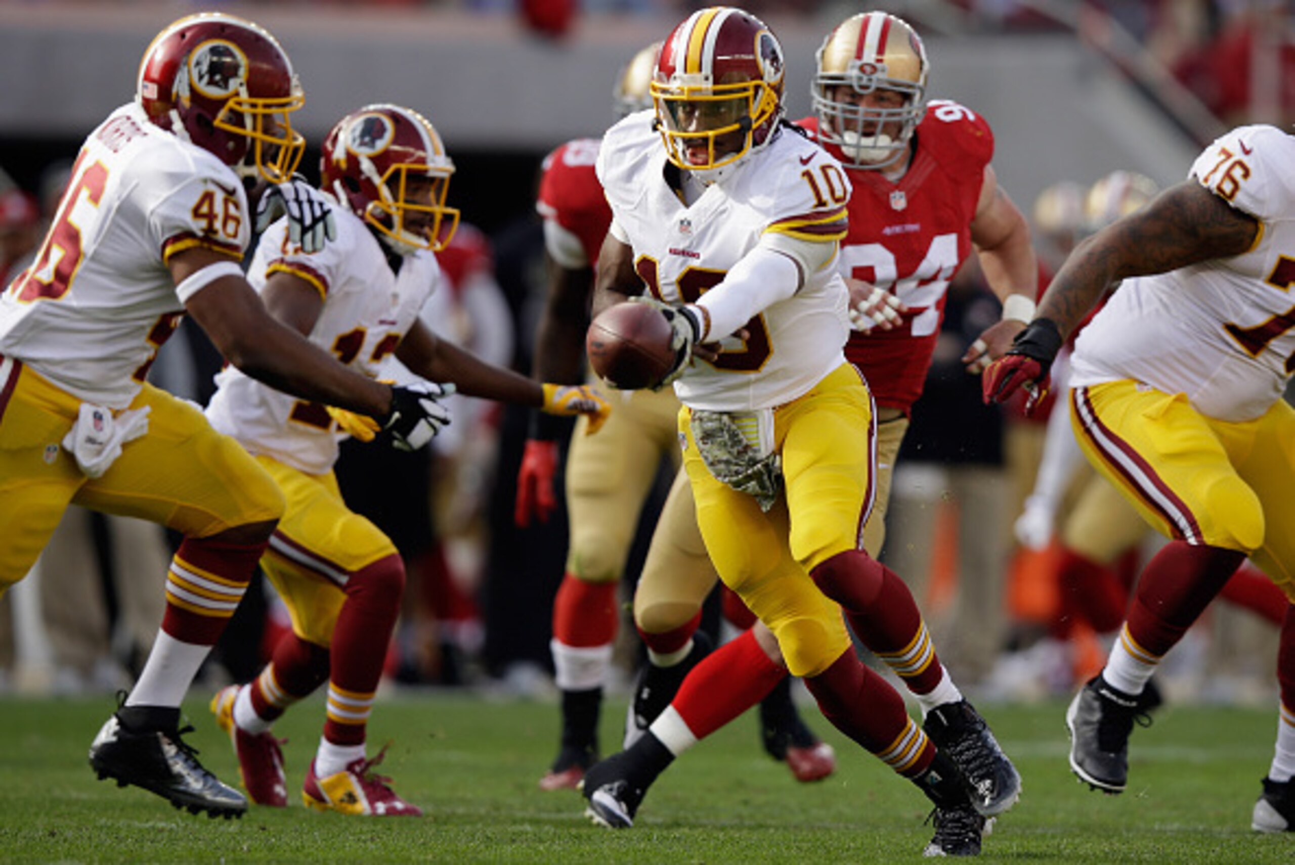 SANTA CLARA, CA - NOVEMBER 23: Robert Griffin III #10 of the Washington Redskins hands off to Alfred Morris #46 of the Washington Redskins against the San Francisco 49ers at Levi's Stadium on November 23, 2014 in Santa Clara, California.  (Photo by Ezra S