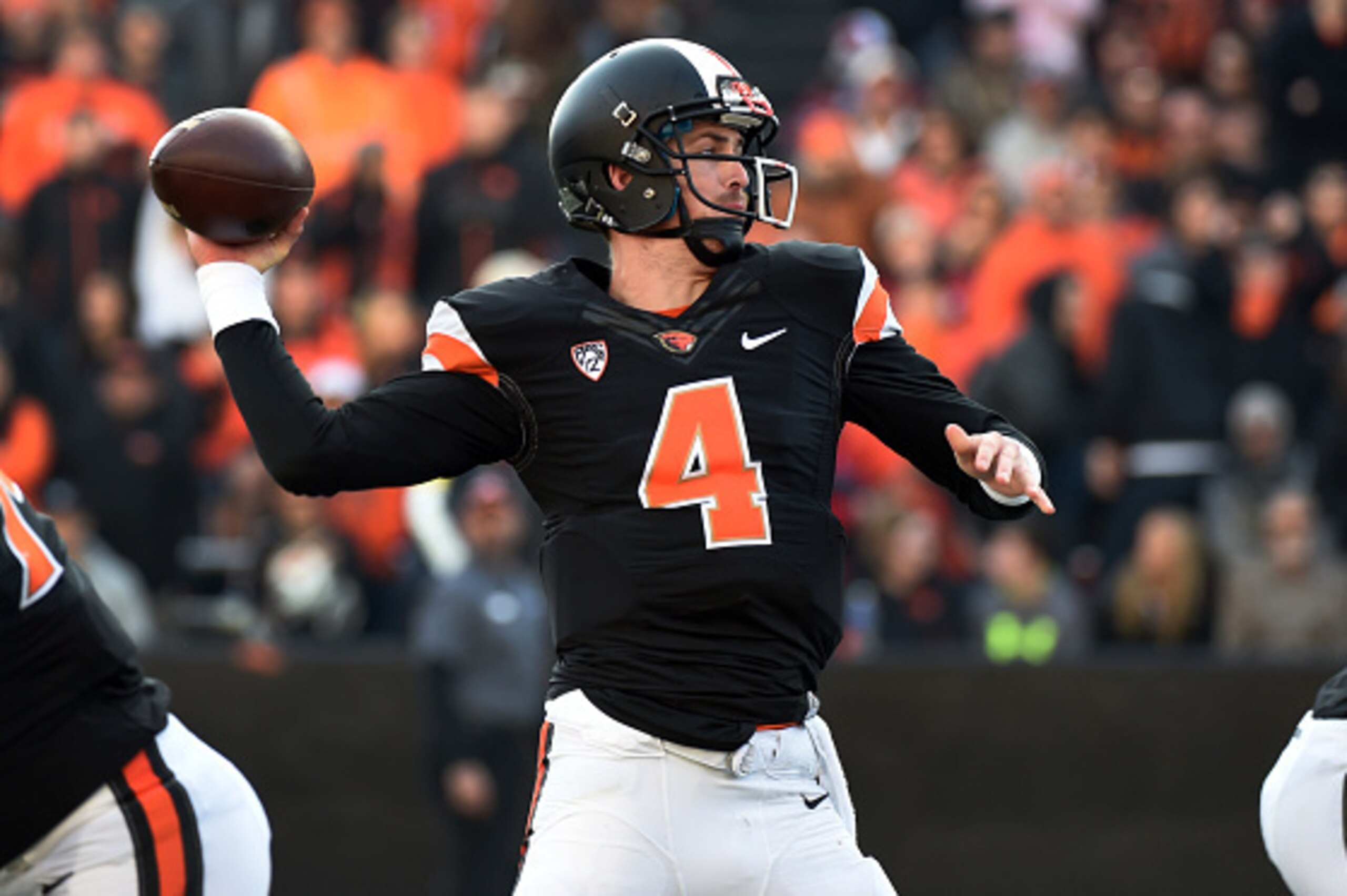 CORVALLIS, OR - NOVEMBER 08: Quarterback Sean Mannion #4 of the Oregon State Beavers passes the ball during the third quarter  of the game against the Washington State Cougars at Reser Stadium on November 8, 2014 in Corvallis, Oregon. (Photo by Steve Dyke