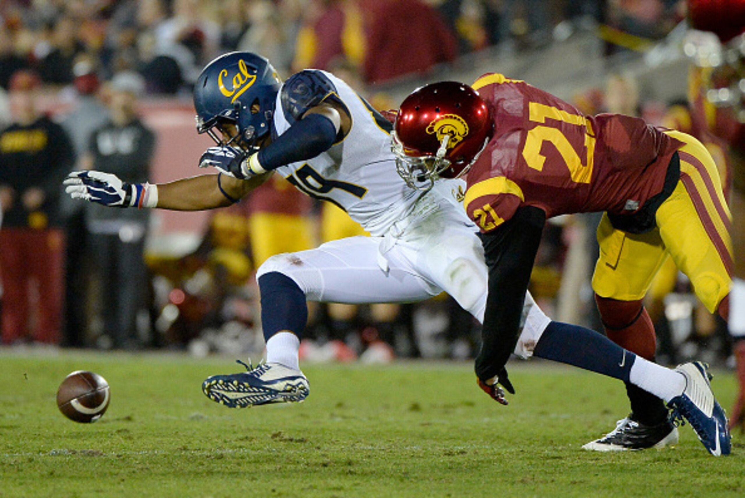 LOS ANGELES, CA - NOVEMBER 13:  Stephen Anderson #89 of the California Golden Bears drops a pass in front of Su'a Cravens #21 of the USC Trojans at Los Angeles Memorial Coliseum on November 13, 2014 in Los Angeles, California.  (Photo by Harry How/Getty I