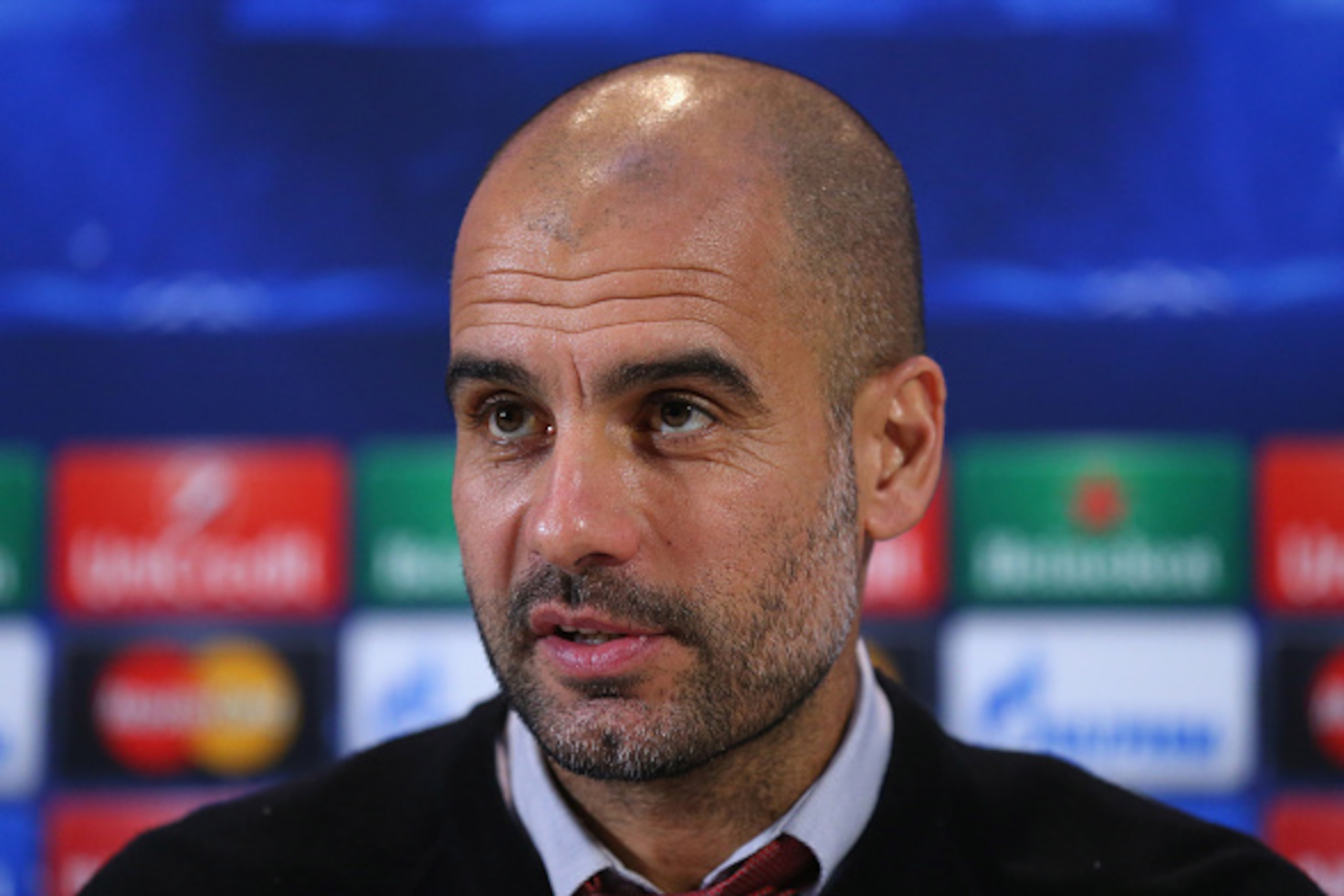 MANCHESTER, ENGLAND - NOVEMBER 24: Pep Guardiola the coach of FC Bayern Muenchen faces the media during a press conference at the Lowry Hotel on November 24, 2014 in Manchester, United Kingdom. (Photo by Alex Livesey/Getty Images) MANCHESTER, ENGLAND - NOVEMBER 24: Pep Guardiola the coach of FC Bayern Muenchen faces the media during a press conference at the Lowry Hotel on November 24, 2014 in Manchester, United Kingdom. (Photo by Alex Livesey/Getty Images)